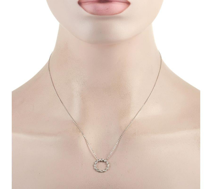 This elegant LB Exclusive 14K White Gold 0.14 ct Diamond Necklace will never get out of style! The necklace is made with a white gold chain, highlighting a matching 14K white gold openwork circle pendant. The pendant is set with round diamonds, each