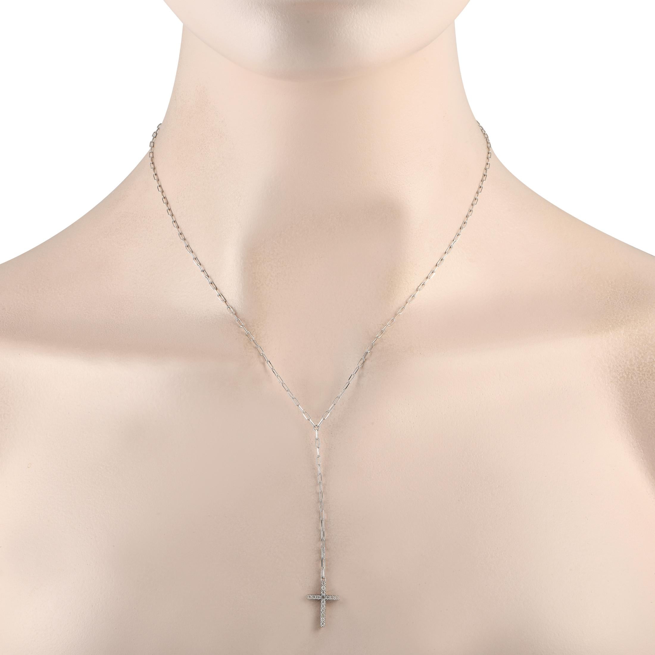 This Y-shaped necklace offers a modern alternative to a traditional cross necklace. Suspended at the center of a delicate 17 chain, a cross-shaped pendant measuring 0.65 long by 0.45 wide is suspended from a 2.75 drop chain. Diamonds with a total