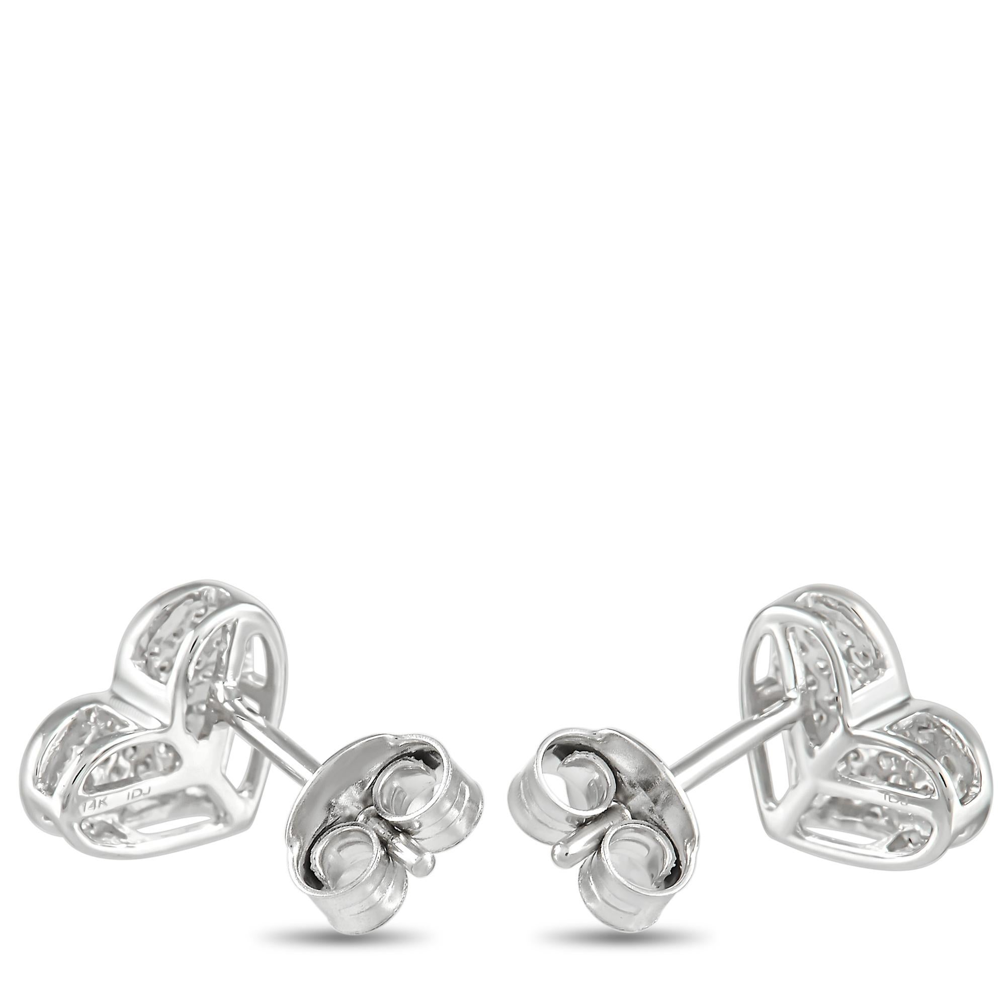 These pretty LB Exclusive earrings will put a smile on your face. The earrings are made from 14K white gold, forming a cute heart-shaped stud. The face of each heart is set with round-cut diamonds over the face of each earring, for a total of 0.16