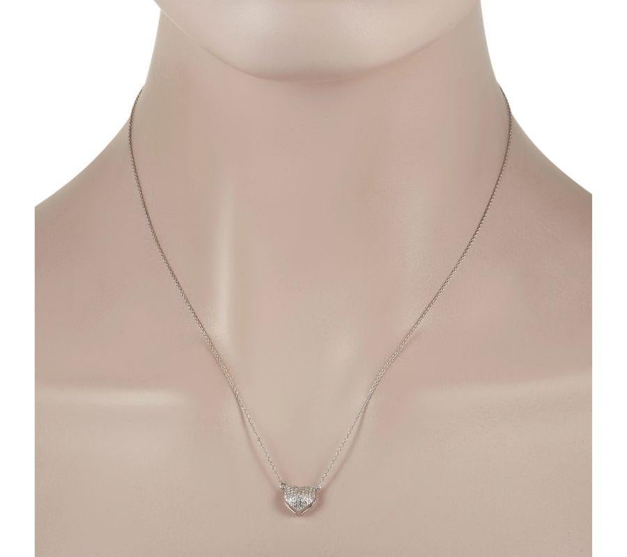 This luxurious necklace is ready to serve as a stylish perfect symbol of your love. Crafted from shimmering 14K White Gold, it features a 3D heart-shaped pendant measuring 0.5” long and 0.45” wide is suspended at the center of a delicate 18” chain.