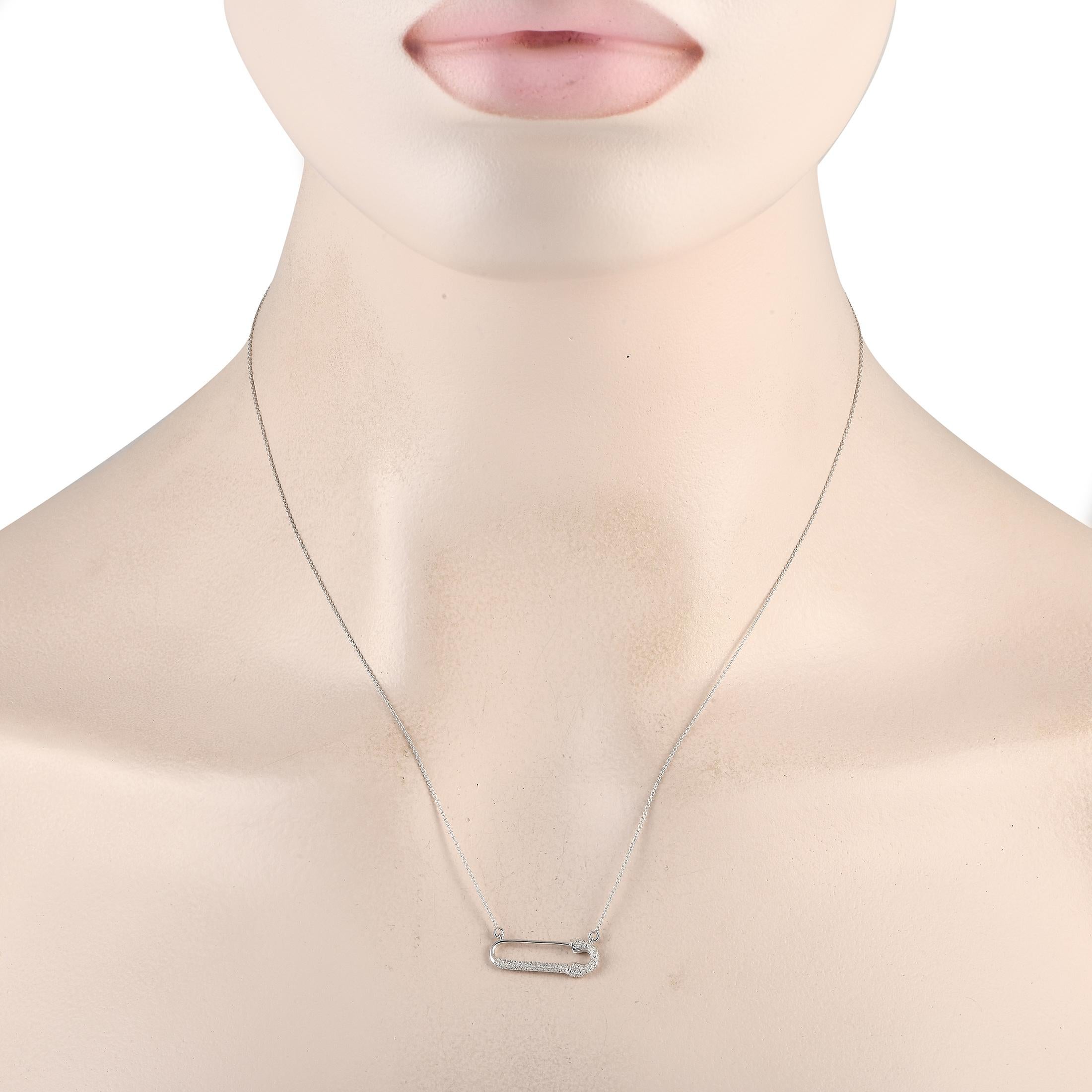 This exquisite necklace has a chic, contemporary sense of style. Suspended at the center of an 18 chain, youll find a safety pin shaped pendant measuring 0.25 long by 0.75 wide. This piece is crafted from 14K white gold and features diamonds with a