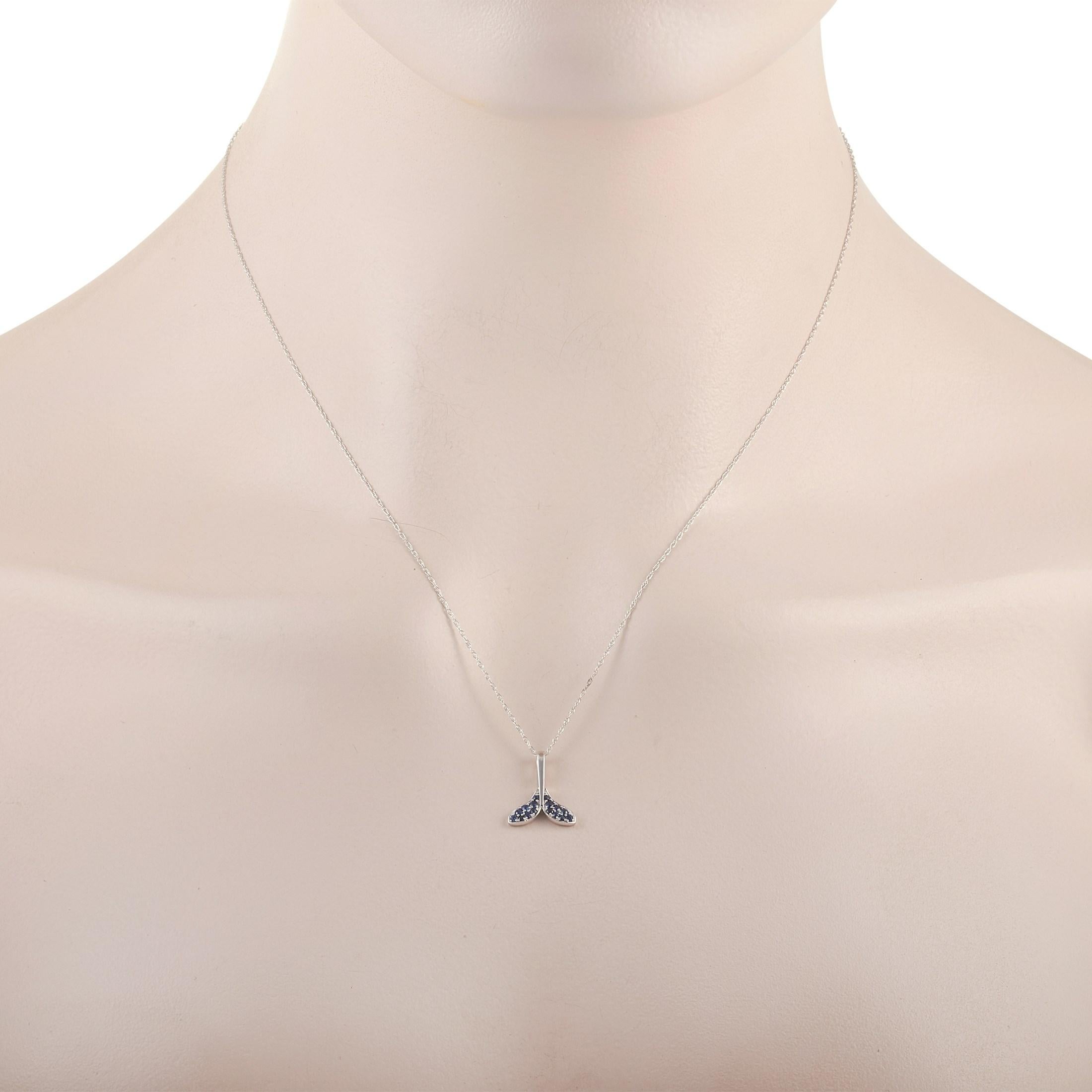 The LB Exclusive 14K White Gold 0.19 ct Sapphire Pendant Necklace features a delicate 14K White Gold chain that is 17 inches in length and includes a matching 14K White gold pendant in the shape of a mermaids tail set with 0.19 carats of round cut