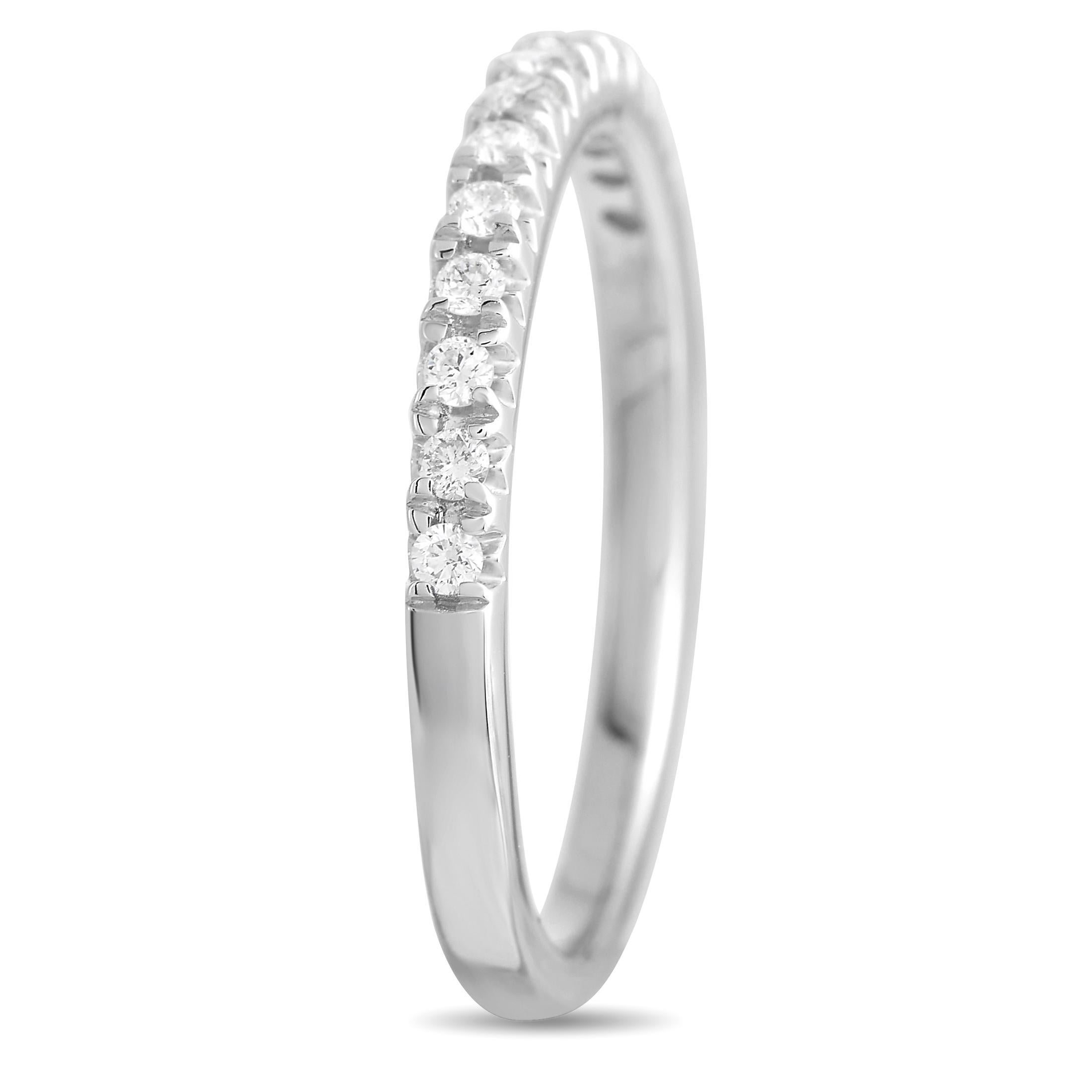 This diamond band ring is truly luxurious. On this design, you’ll find 0.20 carats of sparkling diamonds paired with a 14K White Gold setting. It measures 2mm wide and will pair well with all of your other pieces. 
 
 This jewelry piece is offered