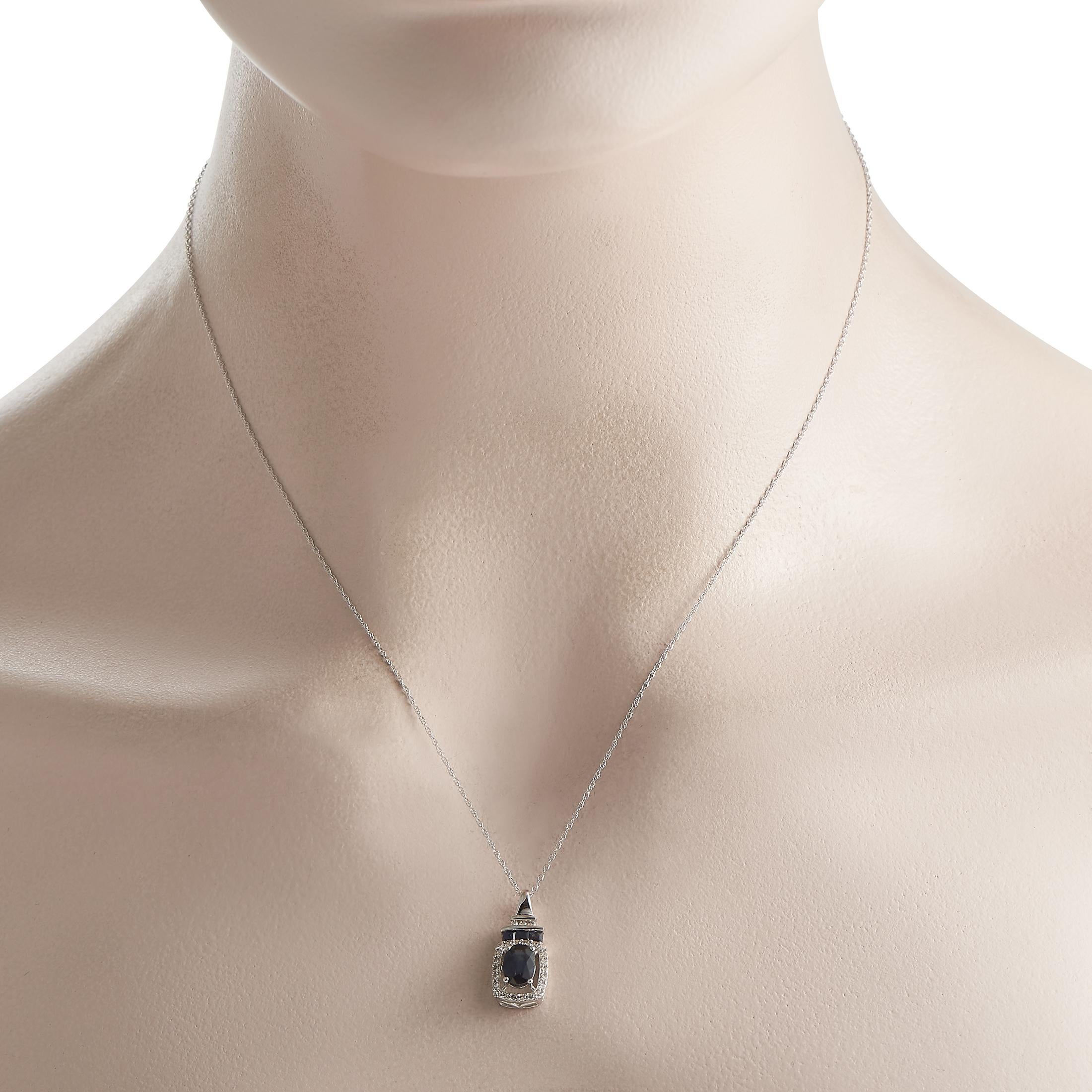 Think your daily office wear could use a bit more bling? Consider this diamond and sapphire necklace. An LB Exclusive piece, it comes with a 17 long chain in 14K white gold. Its polished bail has a stepped profile, punctuated by a trio of diamonds