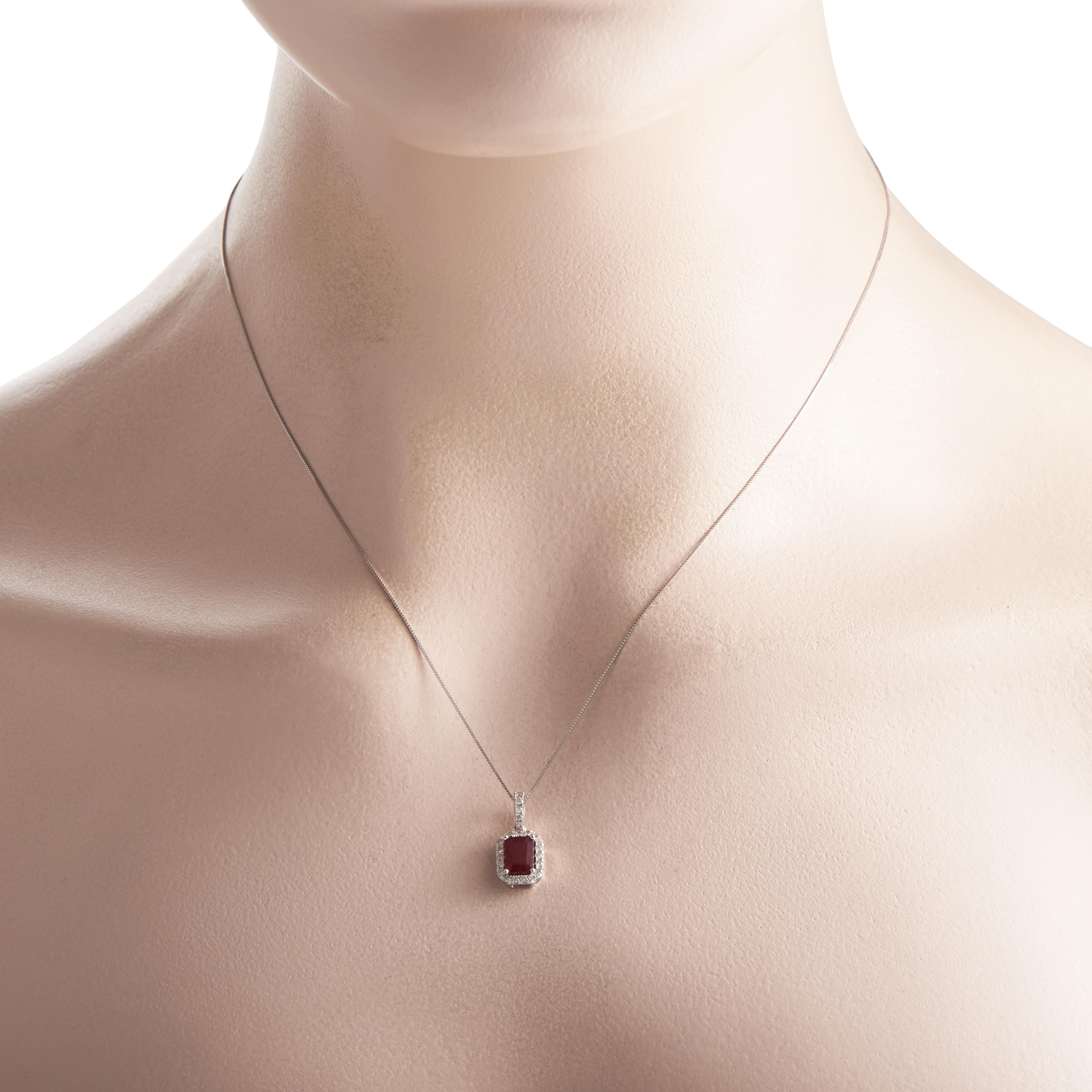 This necklace makes it easier to add a vintage flair to your looks. Crafted in 14K white gold, this LB Exclusive necklace has a 1.28 carat step-cut ruby pendant surrounded by 0.20 carats of round diamonds. It is held by a diamond-traced bail on an