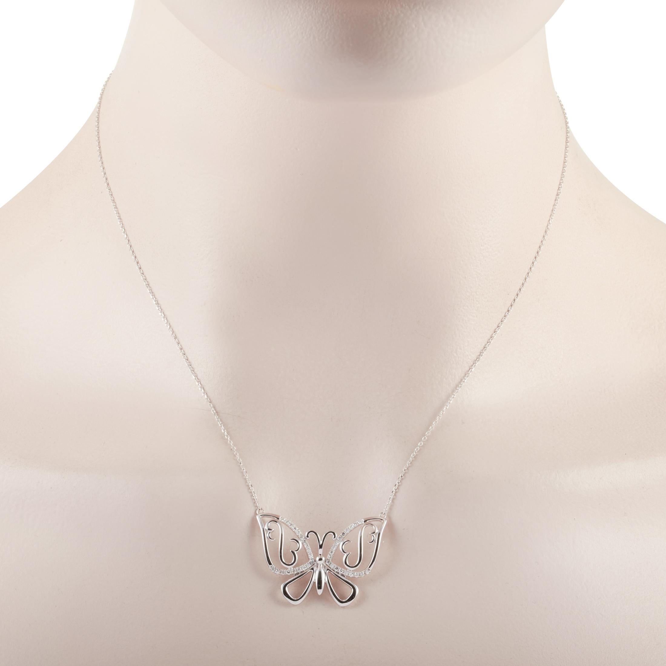 This LB Exclusive necklace is crafted from 14K white gold and weighs 4.2 grams. It is presented with a 15” chain and boasts a butterfly pendant that measures 0.88” in length and 1.13” in width. The necklace is set with diamonds that total 0.25