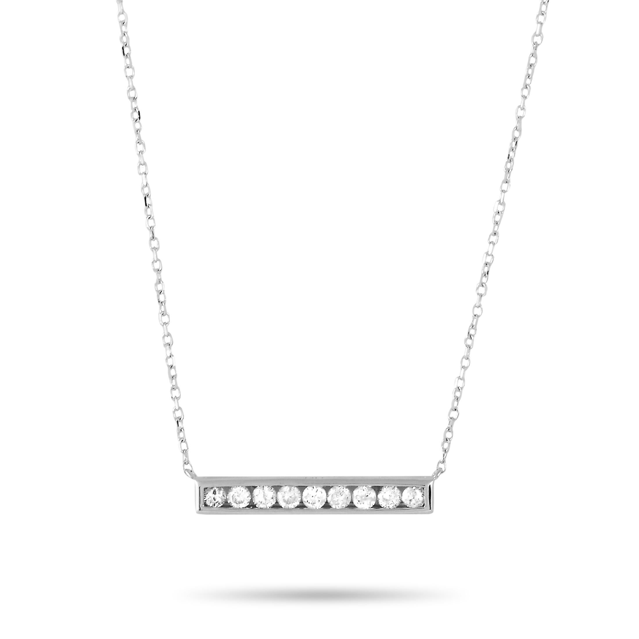This LB Exclusive necklace is made of 14K white gold and embellished with diamonds that amount to 0.25 carats. The necklace weighs 1.8 grams and boasts a 15” chain and a pendant that measures 0.75” in width.
 
 Offered in brand new condition, this
