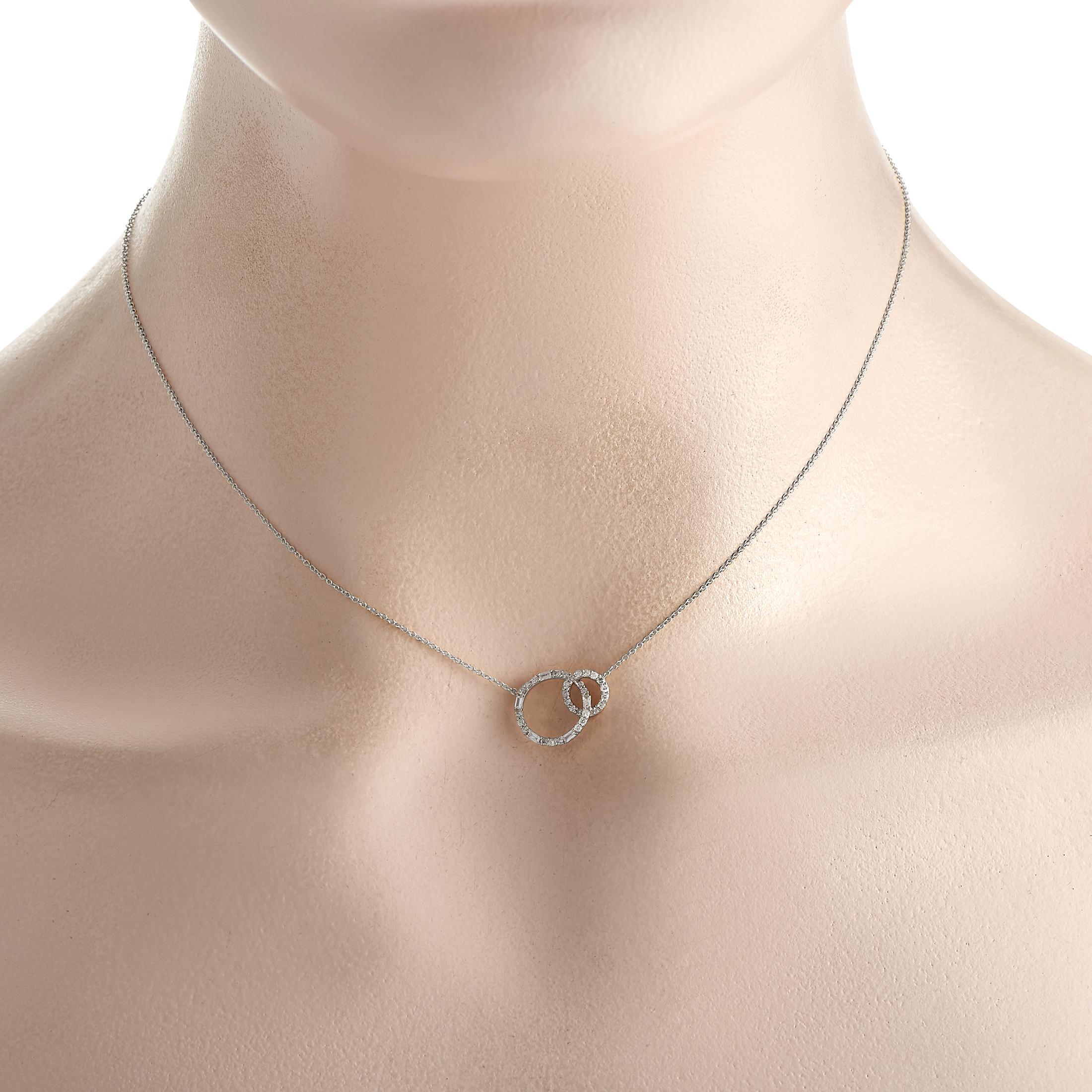 A lovely necklace that makes a symbolic gift. This LB Exclusive piece features a pendant with two sparkling circles intertwined, perfectly representing a bond between two people or the journey of two lives intertwined. The pendant measures 0.5