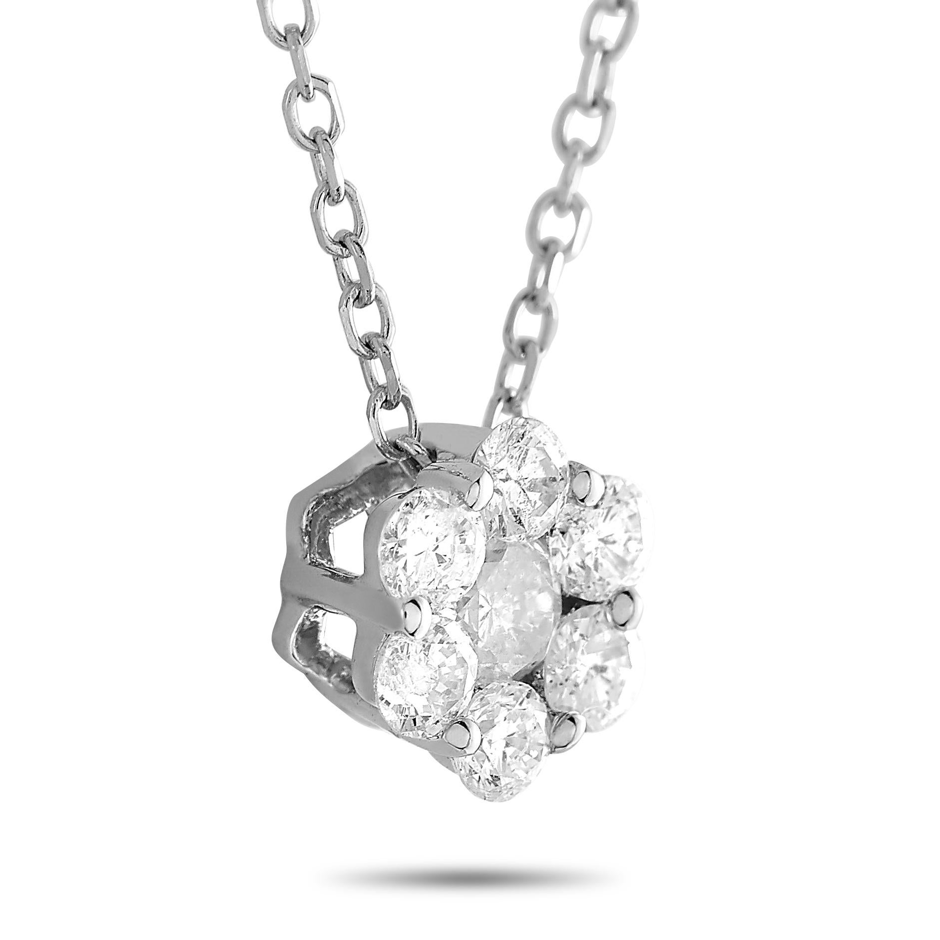This LB Exclusive necklace is crafted from 14K white gold and weighs 1.2 grams. It is presented with a 15” chain and a pendant that measures 0.25” in length and 0.25” in width. The necklace is embellished with diamonds that total 0.25 carats.
 
