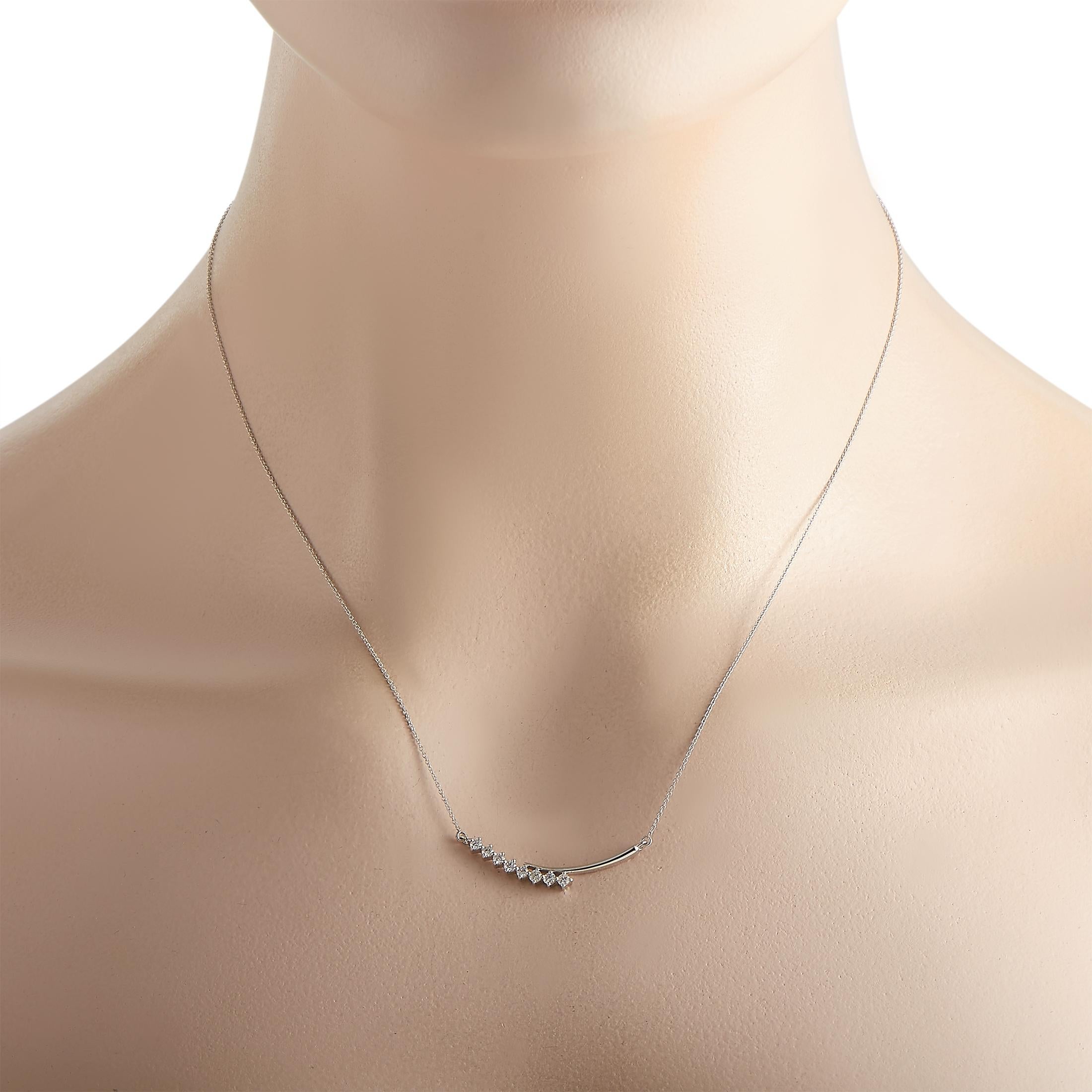 Graceful and breathtaking, this impeccable necklace will effortlessly enhance any ensemble. Suspended from a 16” chain, you’ll find a series of sparkling diamonds totaling 0.26 carats paired with a sleek 14K White Gold accent. A pendant measuring