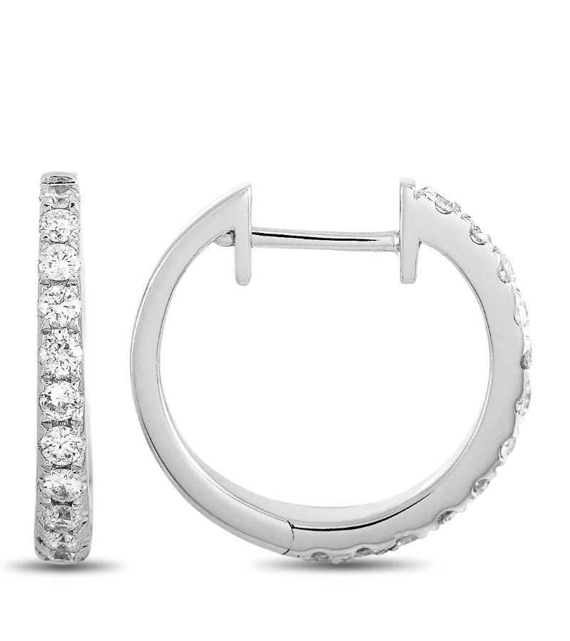 These LB Exclusive 14K White Gold 0.31 ct Diamond Hoop Earrings are a lovely addition to any wardrobe. Totaling 0.31 carats of round diamonds, these earrings weigh 1.2 grams each.
