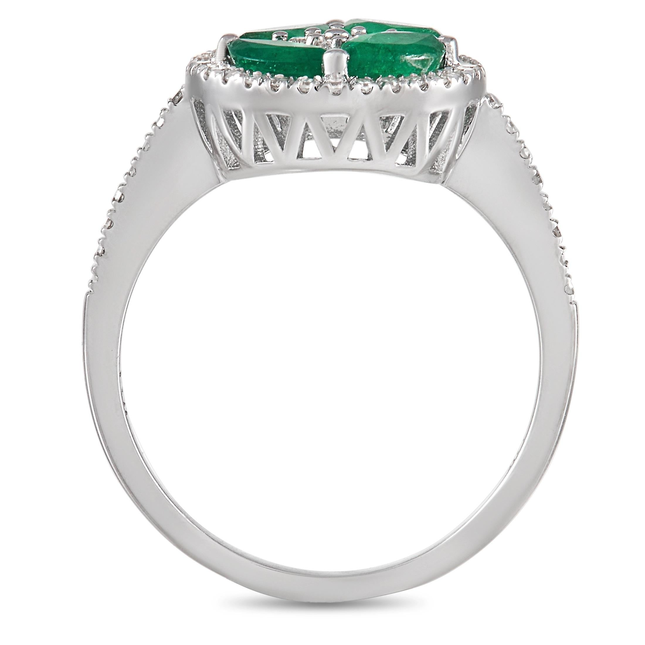 This ring is poised to continually make a stylish statement. At the center, a cluster of emeralds are effortlessly accented by shimmering diamonds totaling 0.33 carats. This piece’s elegant 14K White Gold setting features a 1mm wide band and a 5mm