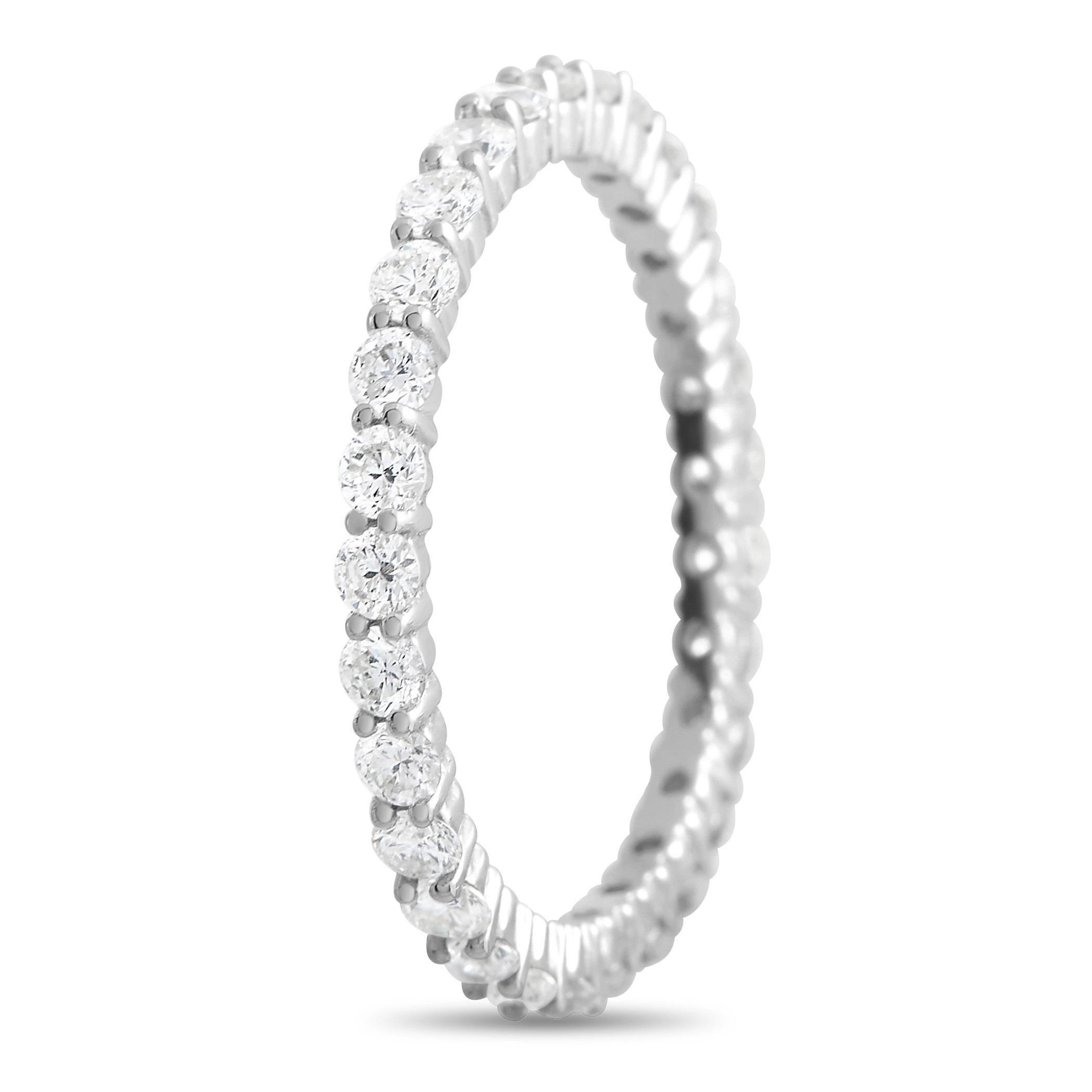 This minimalist band ring makes it easy to make any day a little more luxurious. The top of this 2mm band ring is covered with glittering diamonds totaling 0.33 carats. Crafted from 14K White Gold, it’s a piece that shimmers from every angle. 
 
