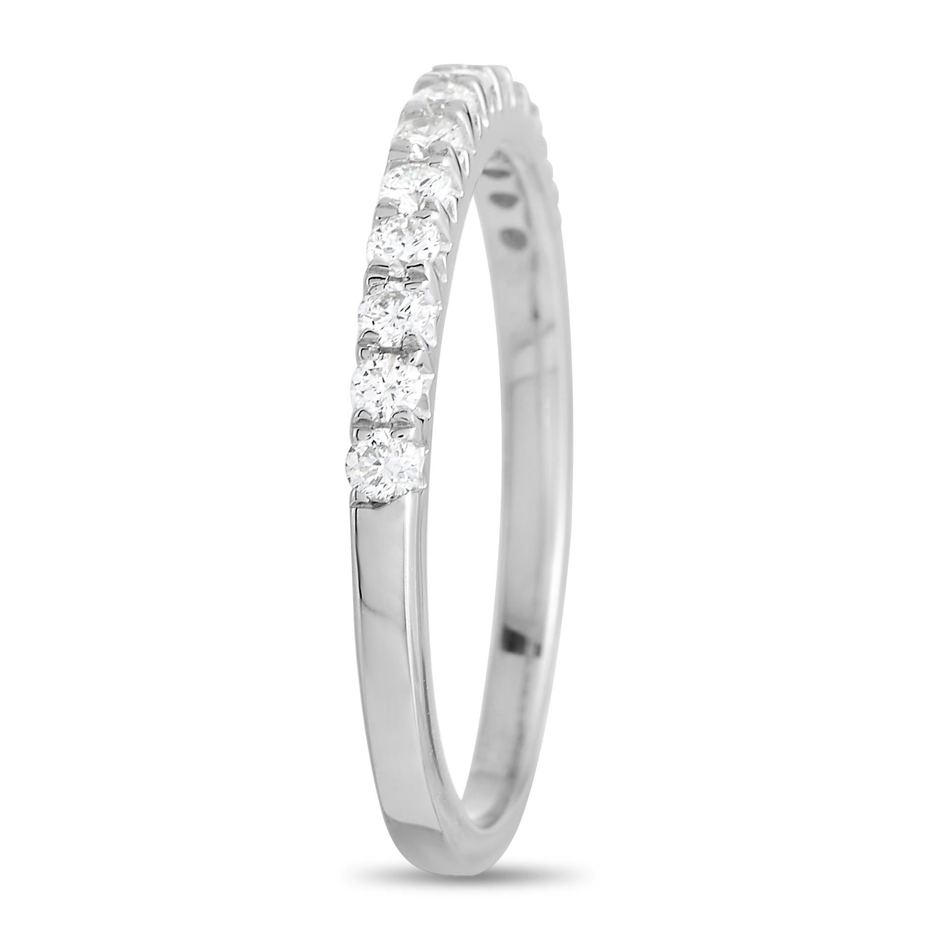 This minimalist band ring makes it easy to make any day a little more luxurious. The top of this 2mm band ring is covered with glittering diamonds totaling 0.33 carats. Crafted from 14K White Gold, it’s a piece that shimmers from every angle. 
 
