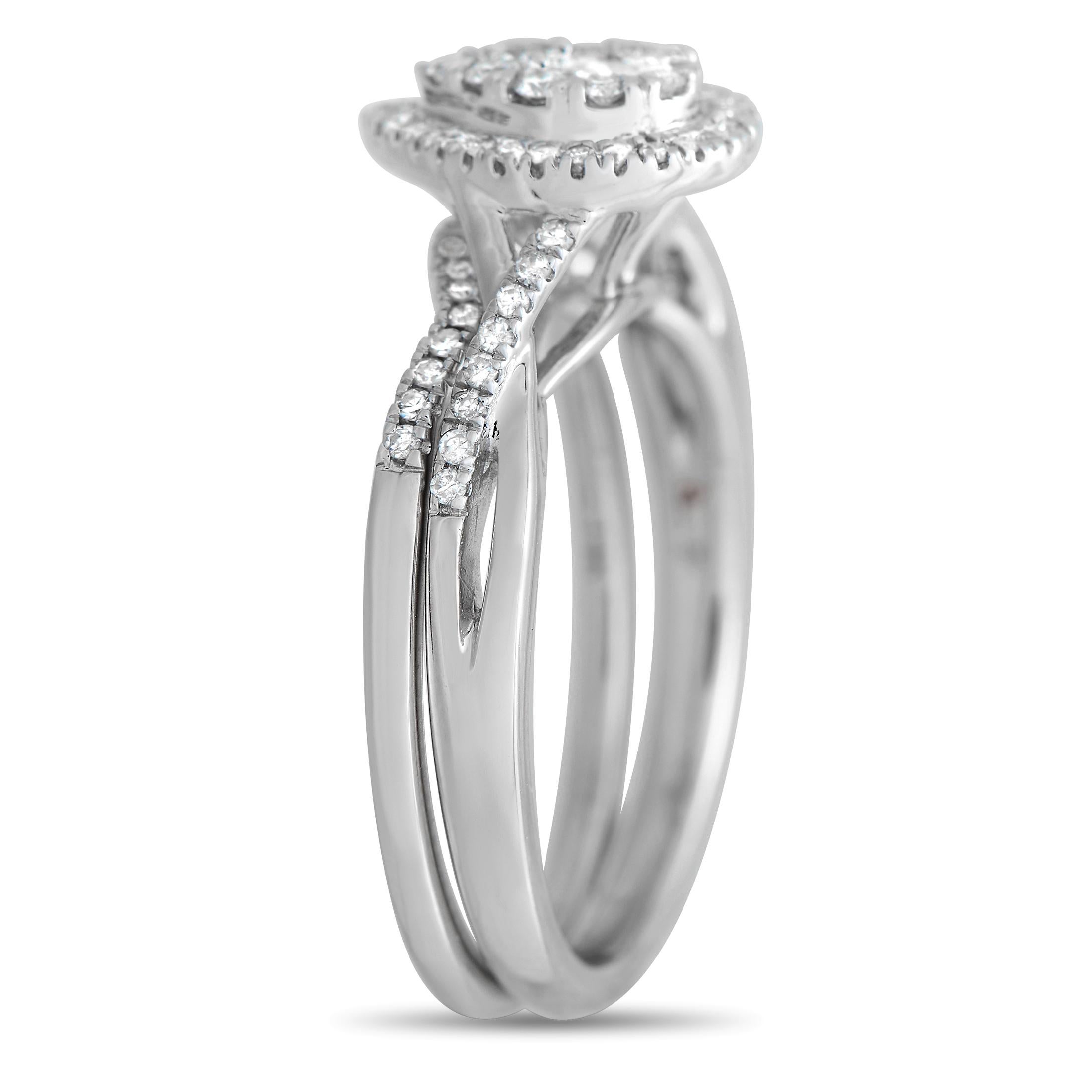 This exceptional 14K White Gold ring set will continually command attention. The sophisticated setting comes to life thanks to inset diamonds that together possess a total weight of 0.40 carats. It features two rings that have a 4mm wide band and a