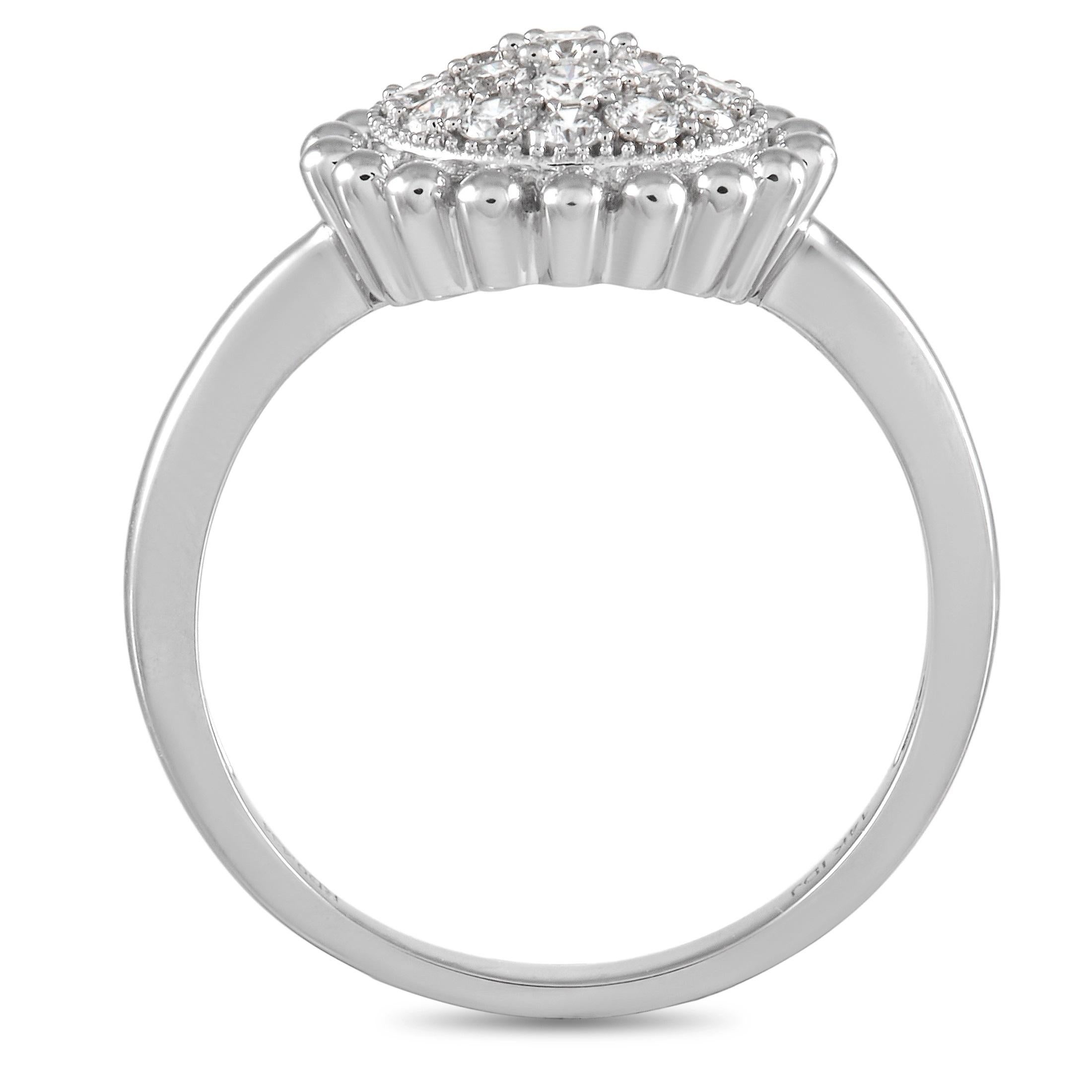 A sleek, modern 14K White Gold setting provides the perfect foundation for this dynamic luxury ring. At the center, a cluster of round-cut diamonds totaling 0.45 carats make this piece sparkle every time it catches the light. With a 1mm wide band