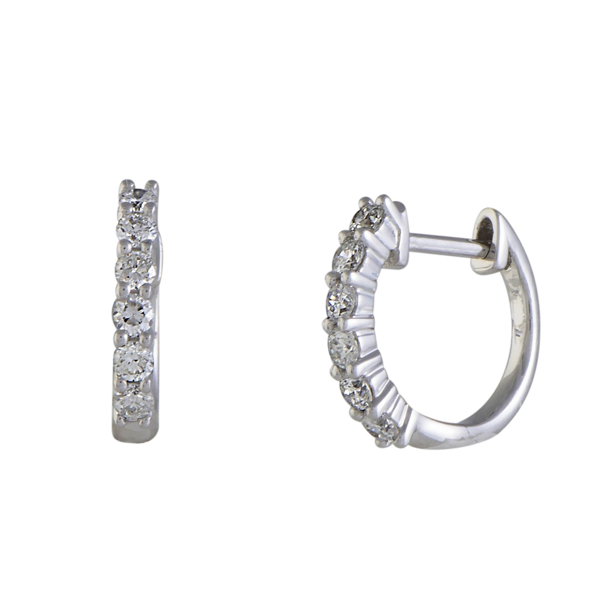Producing a refreshing and prestigiously resplendent allure with their expertly set diamonds weighing in total 0.50 ct, these splendid earrings are made of gleaming 14K white gold for a harmoniously bright overall tone.