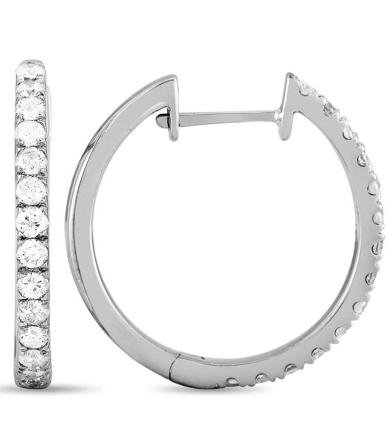 These LB Exclusive hoop earrings are made out of 14K white gold and diamonds that total 0.50 carats. The earrings measure 0.75” in length and width, and each of the two weighs 1.5 grams.
 
 The pair is offered in brand new condition and includes a