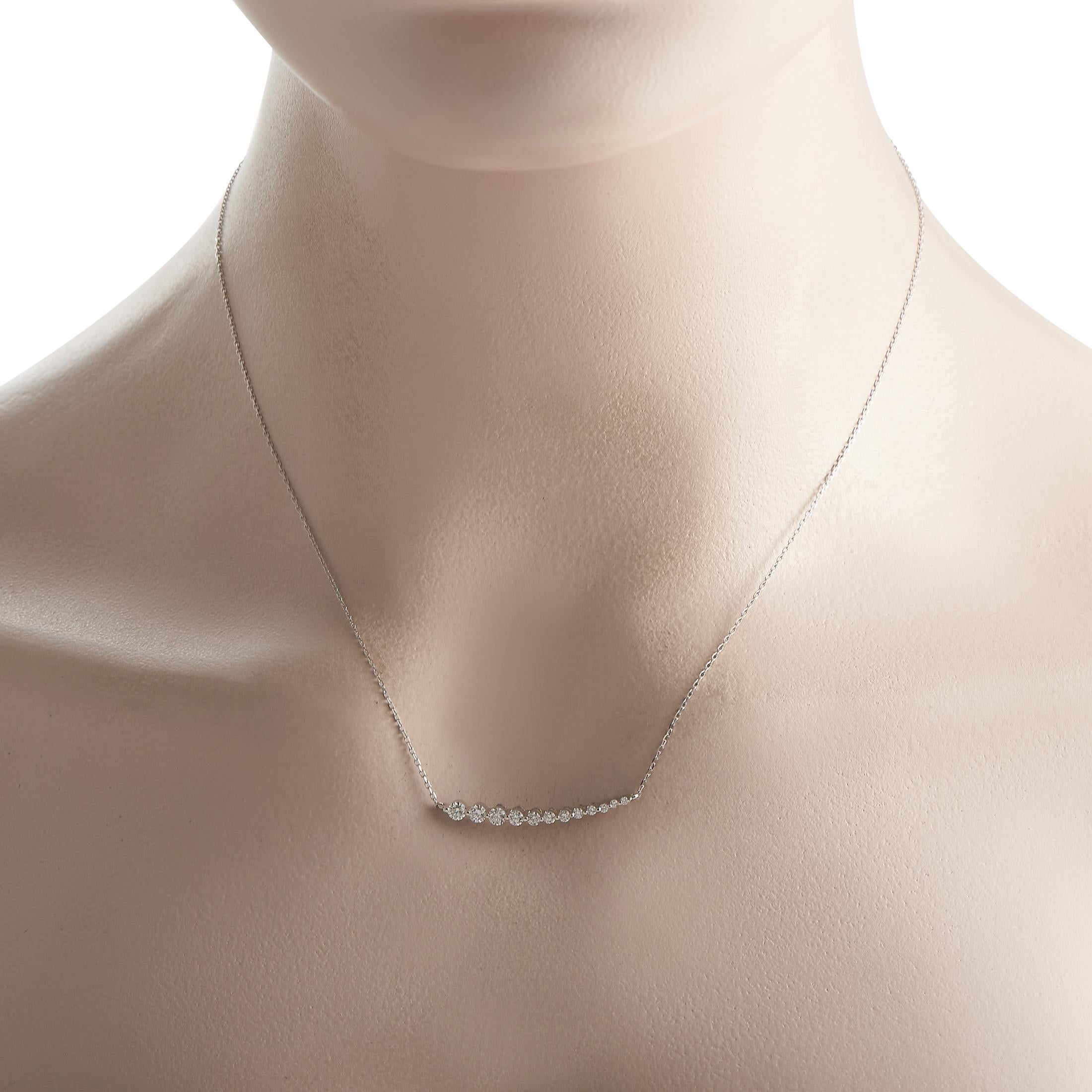 The perfect day-to-night diamond jewelry. This 14K white gold necklace has a delicate cable chain with a lobster clasp. It shimmers with a subtly curved row of tapering diamonds on shared prongs.This brand new LB Exclusive 14K White Gold 0.50ct