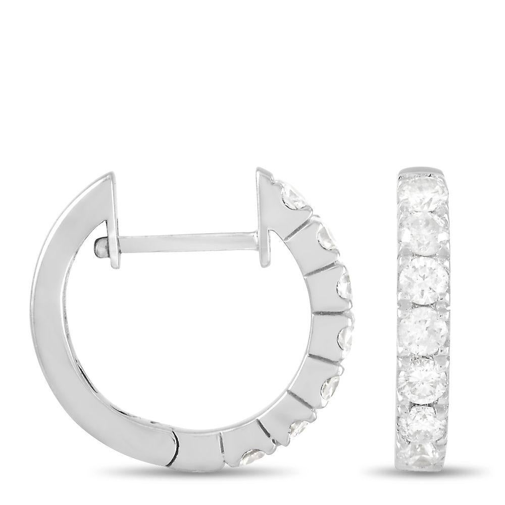 Good things come in small packages, indeed. Just look at these little glittering hoops that are ready to hug your earlobes. The LB Exclusive 14K White Gold 0.59 ct Diamond Huggie Hoop Earrings feature a single row of prong-set diamonds on the front