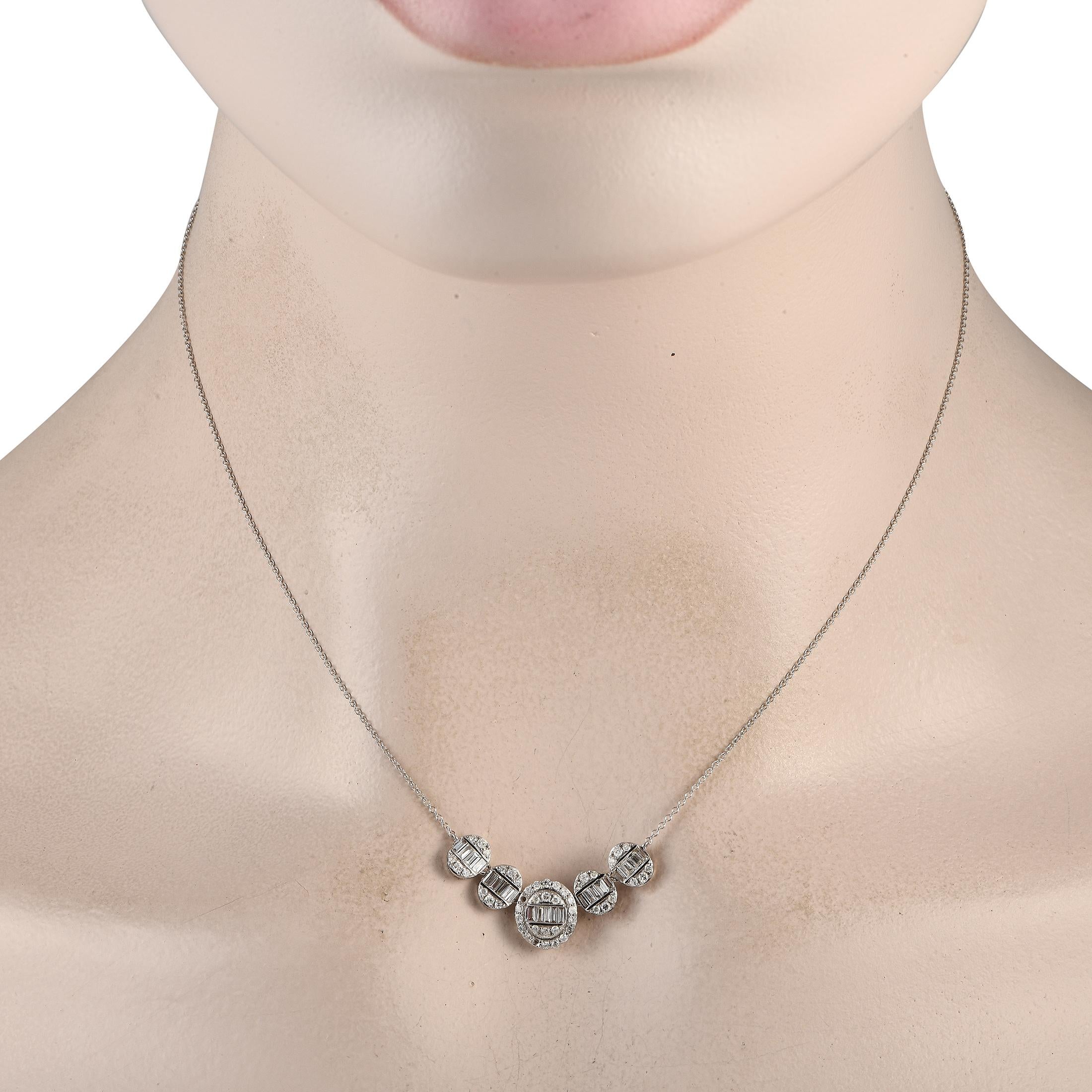 Add a dash of Art Deco inspired glamour to any ensemble with this impeccably crafted necklace. Diamonds with a total weight of 0.60 carats sparkle and shine from their place on the dramatic 14K White Gold pendant. The pendant measures 0.45 long by