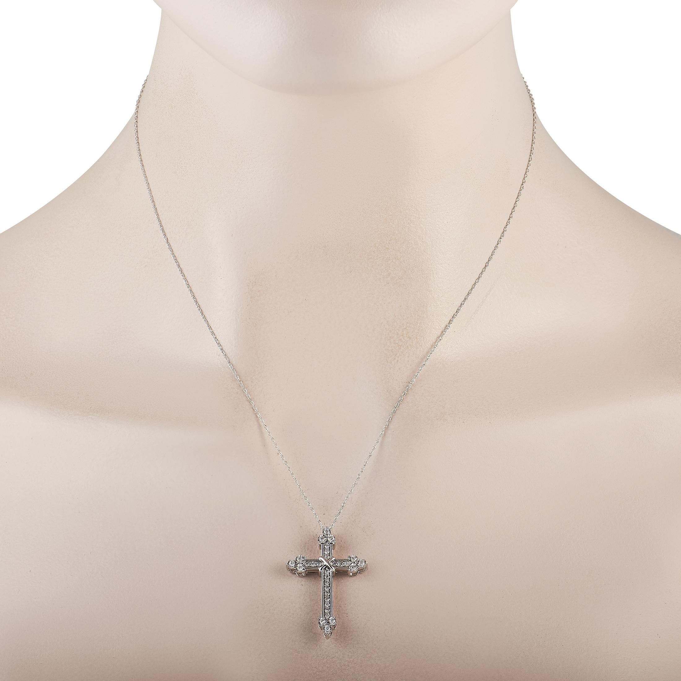 The perfect visible symbol of your belief. This white gold necklace would prove to be as bright and lasting as your faith. It features a diamond-adorned cross pendant measuring 1.25