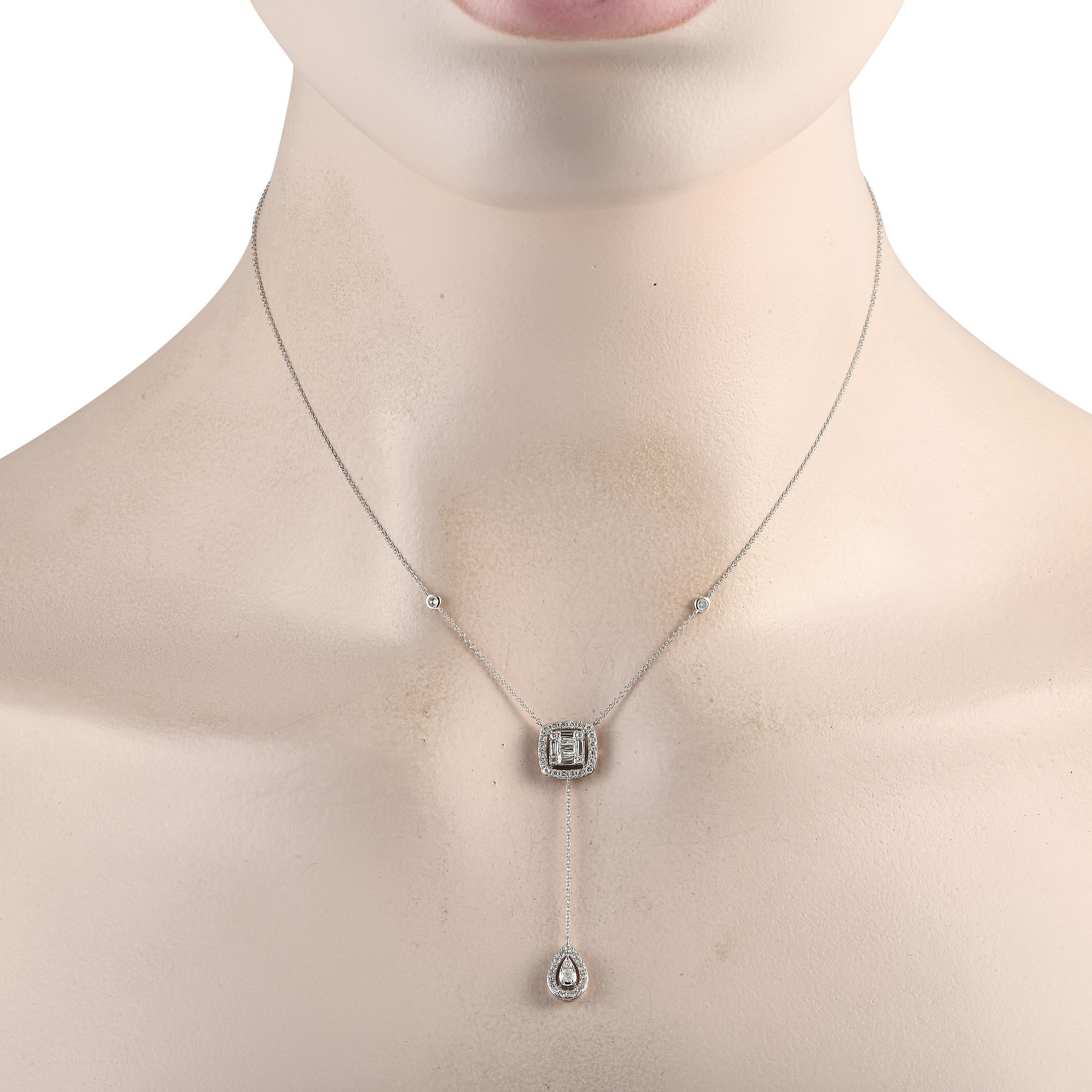 This luxurious necklace will add a touch of sparkle to any ensemble. At the center of this pieces 15 chain, youll find a dangling pendant measuring 2 long. Crafted from 14K White Gold, the design beautifully showcases sparkling Diamonds with a total
