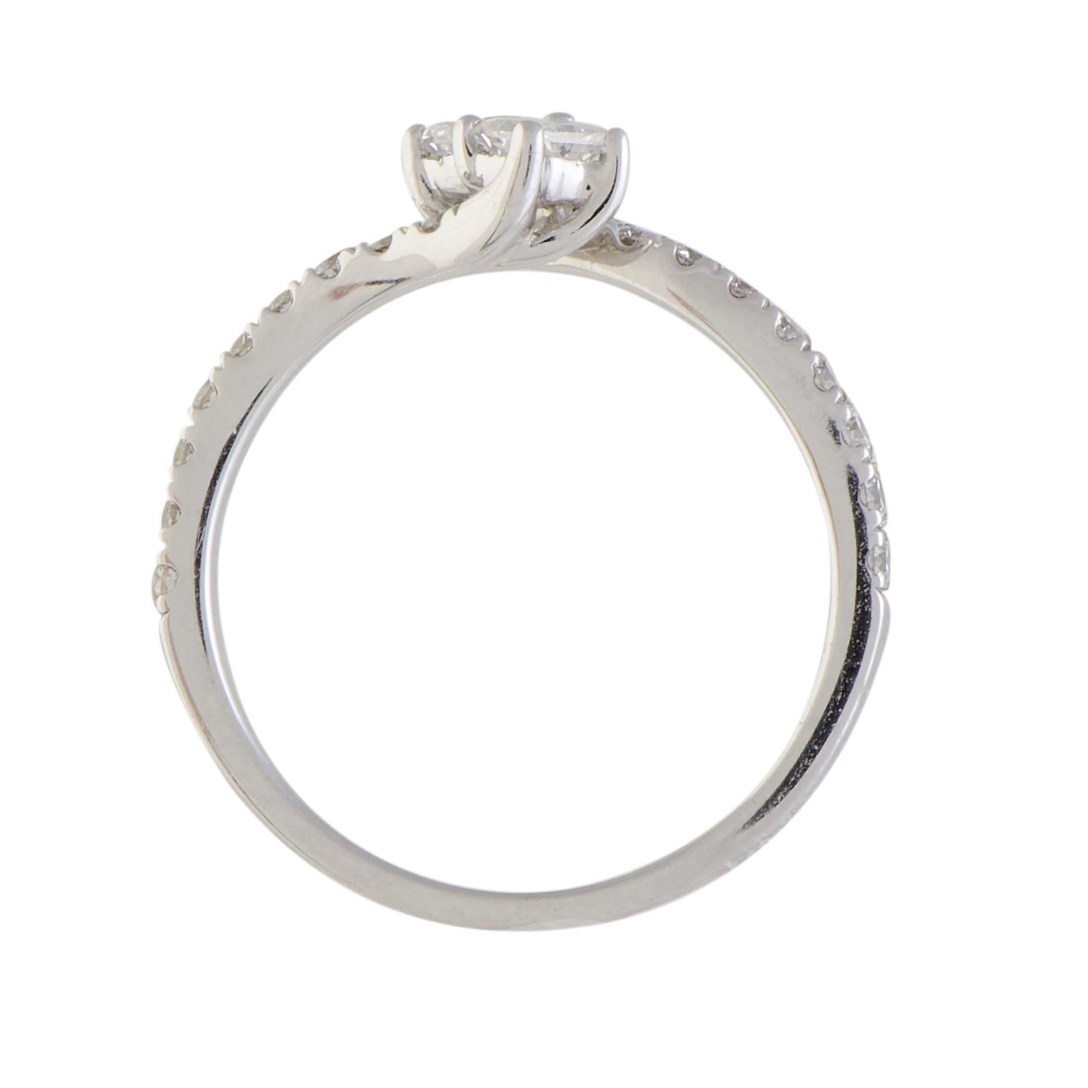 Contributing to the marvelously bright and exceptionally harmonious overall tone, the scintillating diamonds amounting to 0.75ct and immaculately polished 14K white gold ensure a splendid appeal in this stunningly subtle ring.