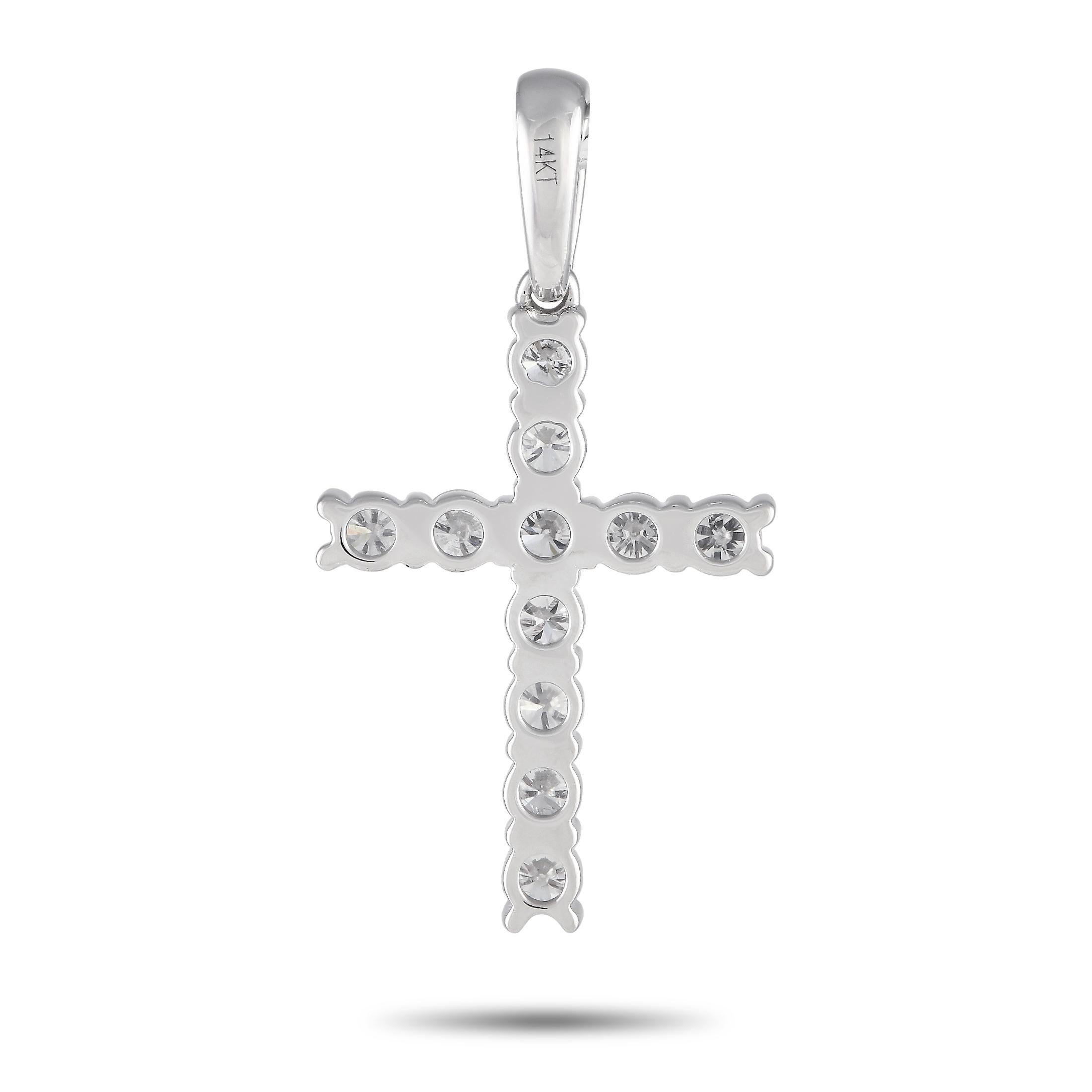 Diamonds with a total weight of 0.92 carats make this cross-shaped pendant simply unforgettable. Crafted from 14K White Gold, this piece measures 1.15\u201d long by 0.65\u201d wide.\r\nThis jewelry piece is offered in brand new condition and