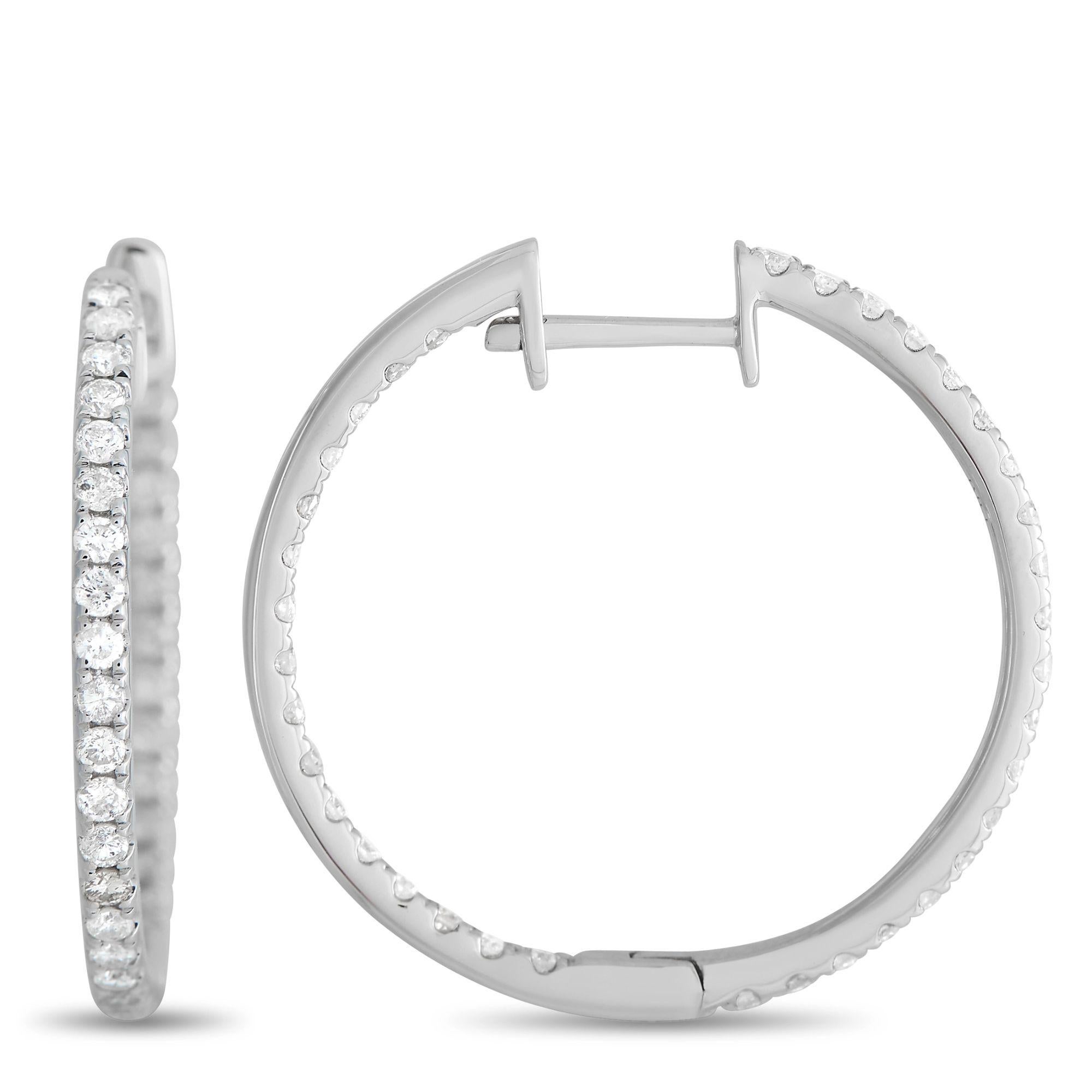 A must-have in every lady's jewelry box. This is your modern diamond hoop designed with an in-and-out display of sparkle. Each hoop features round diamonds running through its outer front face and inner front face. Versatile and elegant yet fun,