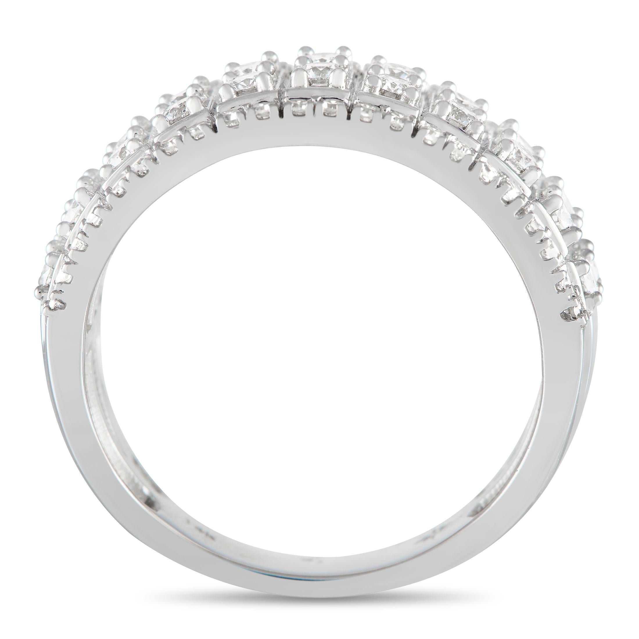 A stunning 14K White Gold setting with a 6mm wide band and a 3mm top height provides an elegant foundation for this radiant ring. At the top of this statement-making accessory, diamonds with a total weight of 1.0 carats allow this piece to sparkle