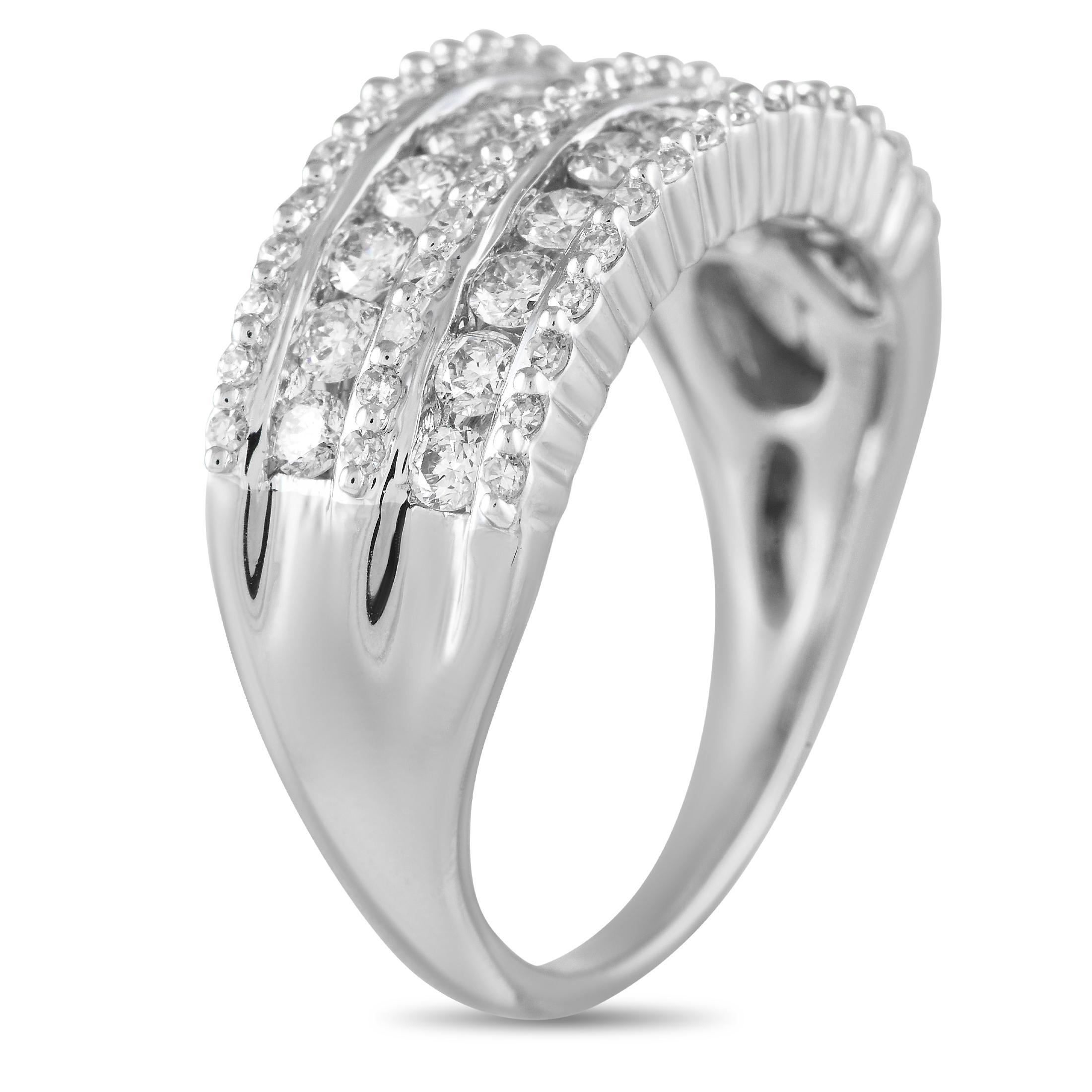 Rows of sparkling Diamonds with a total weight of 1.15 carats make this radiant ring simply unforgettable. This pieces understated 14K white gold setting features a band width and top height measuring 3mm.This jewelry piece is offered in brand new