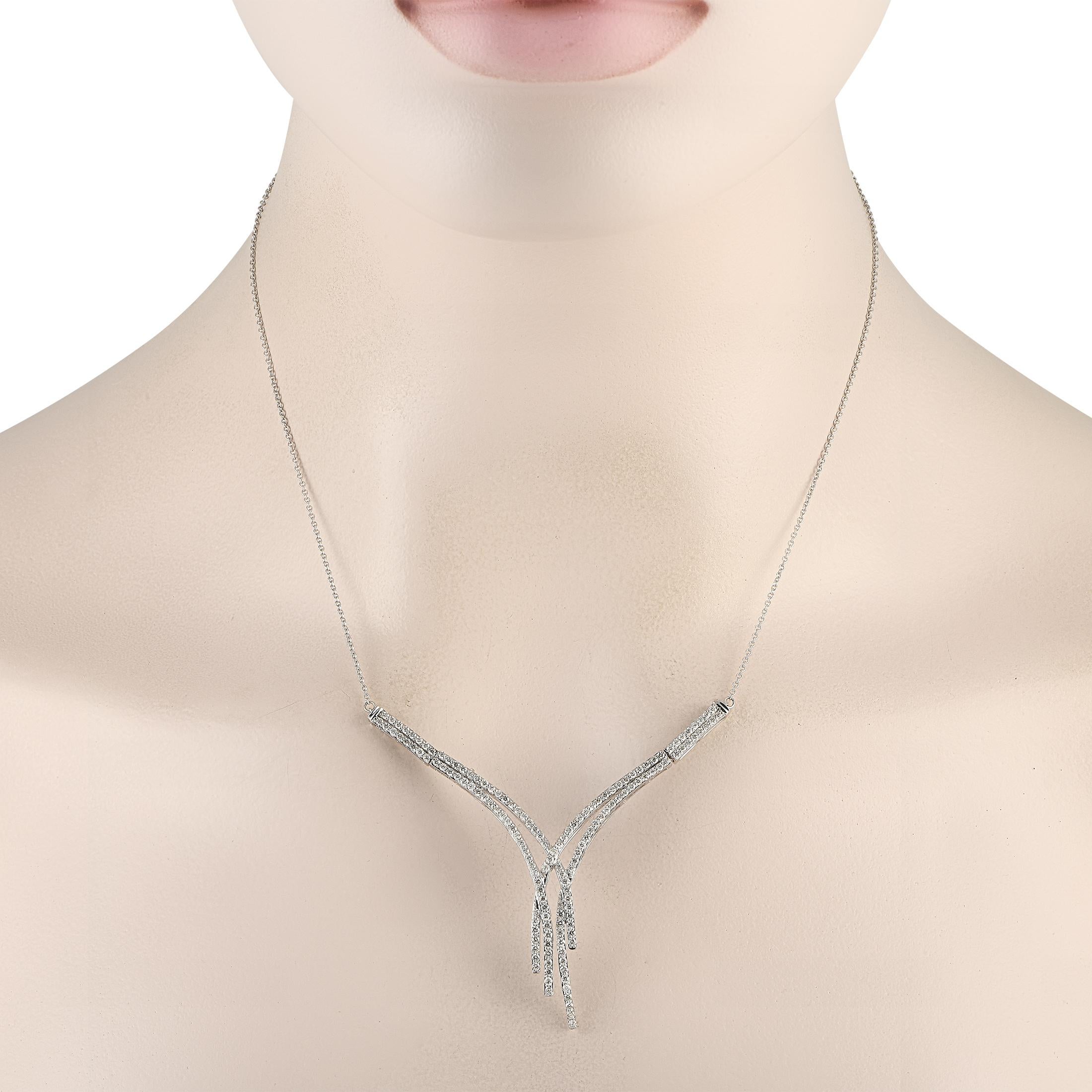 Shimmering strands of Diamonds with a total weight of 1.50 carats make a statement at the center of a 16 chain on this captivating luxury necklace. Crafted from 14K White Gold, this pieces pendant measures 2.50 long by 2.50 wide.This jewelry piece