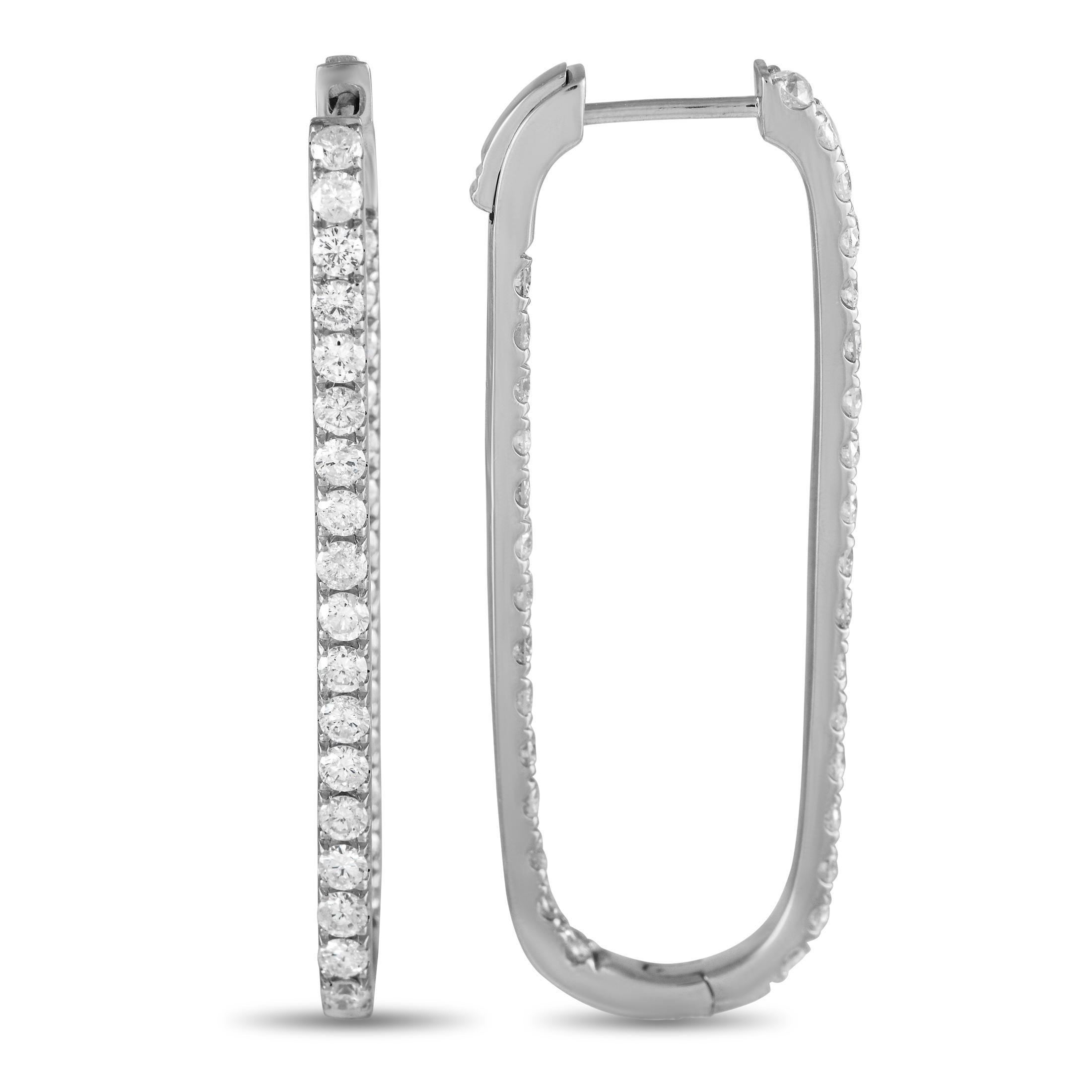 Get more creative with your diamond accessories by wearing these rounded rectangle hoops. Set in 14K white gold, the earrings feature a narrow row of petite round diamonds mounted on the front edge and front-facing back edge of each hoop. They're