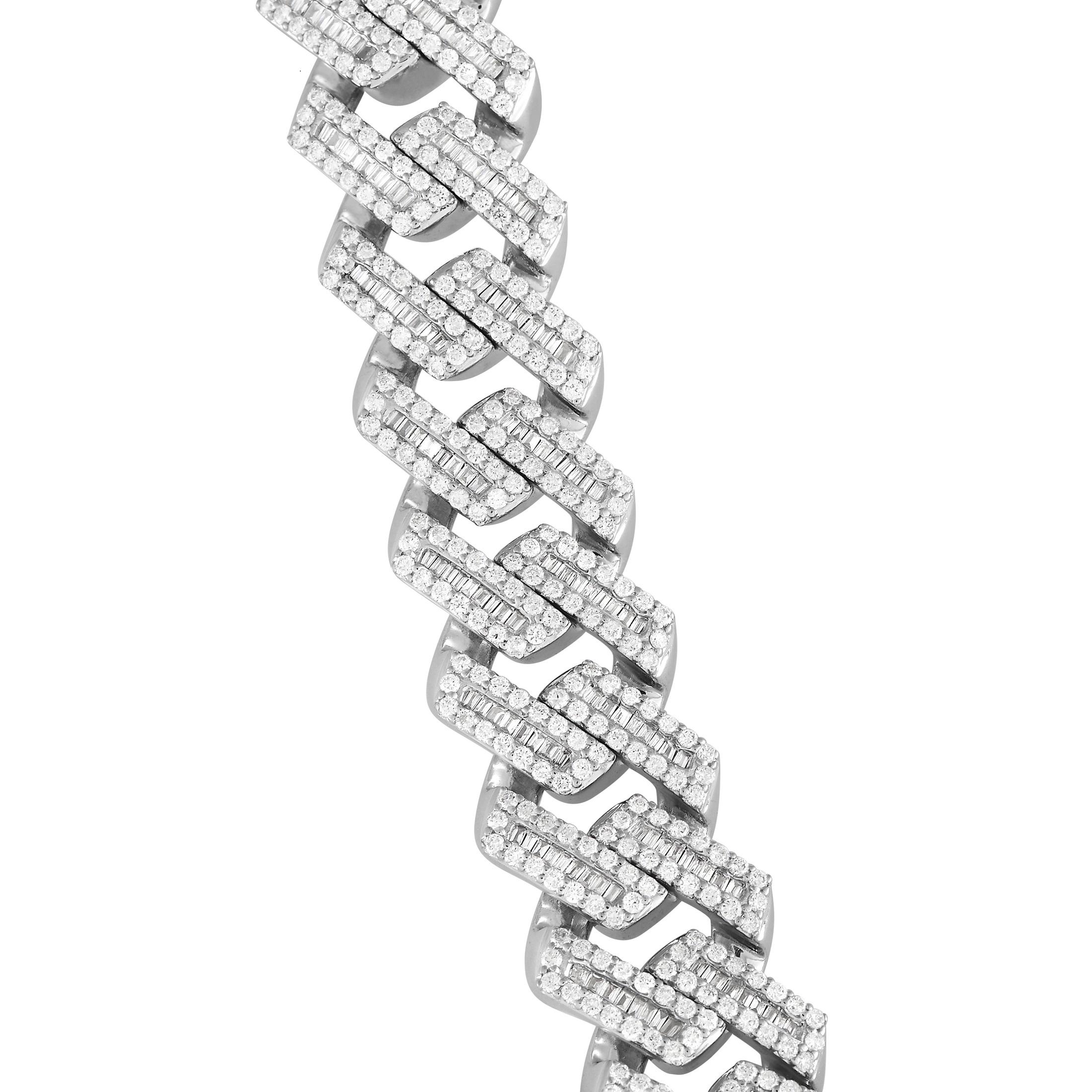 This bold necklace is sure to make a statement no matter what it’s paired with. Links crafted from 14K White Gold sparkle and shine thanks to diamonds with a total weight of 26.15 carats. This impressive piece measures 22” long. 
