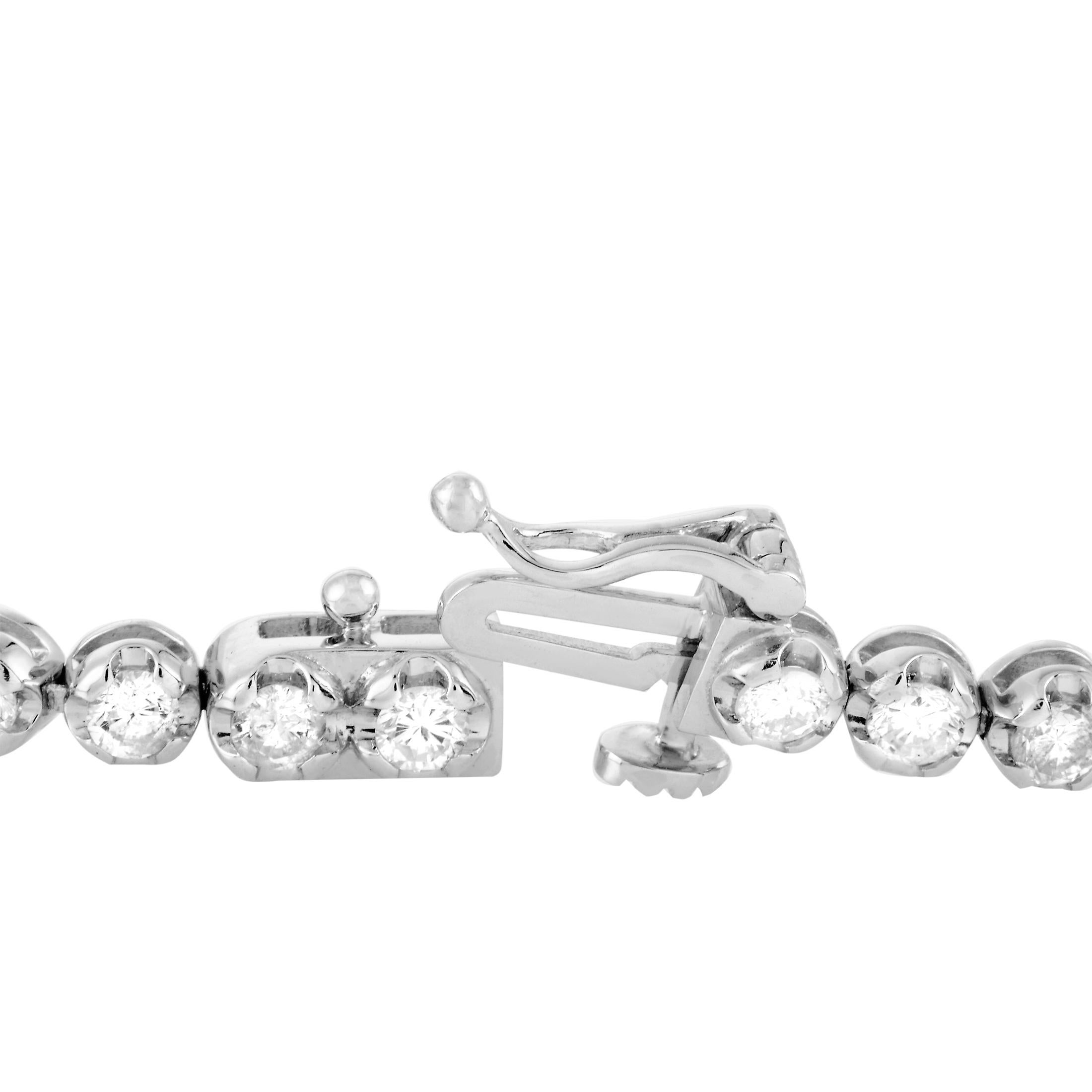 This LB Exclusive tennis bracelet is made out of 14K white gold and diamonds that total 3.00 carats. The bracelet weighs 7.5 grams and measures 7” in length.

Offered in brand new condition, this jewelry piece includes a gift box.