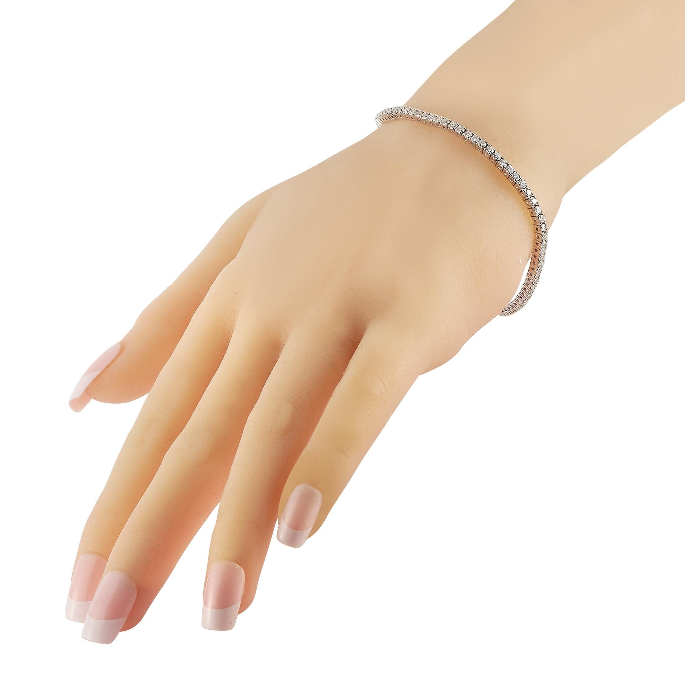 Add a touch of luxury to any outfit with this stylish, understated tennis bracelet. This piece’s sleek 14K White Gold setting measures 7.25” long and is adorned with round-cut diamonds totaling 3.14 carats. 
 
 This jewelry piece is offered in