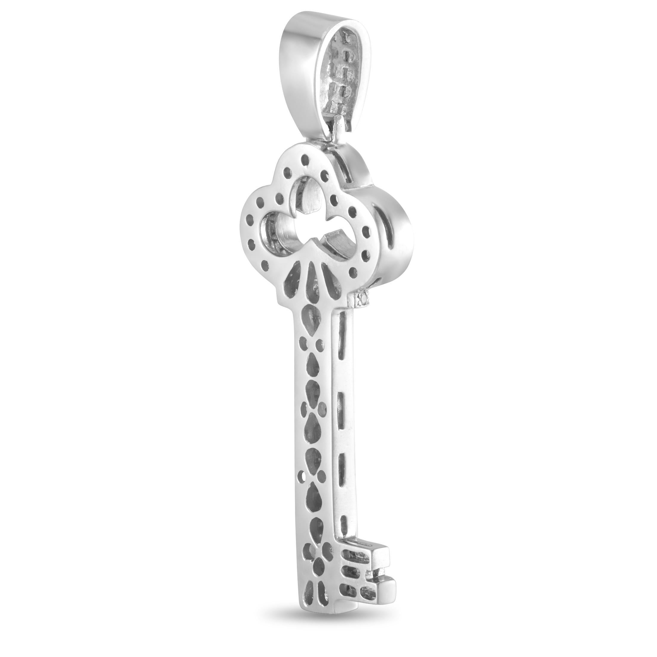 This LB Exclusive key pendant is made of 14K white gold and embellished with diamonds that amount to 3.50 carats. The pendant weighs 31.5 grams and measures 2.75” in length and 1” in width.
 
 Offered in estate condition, this item includes a gift