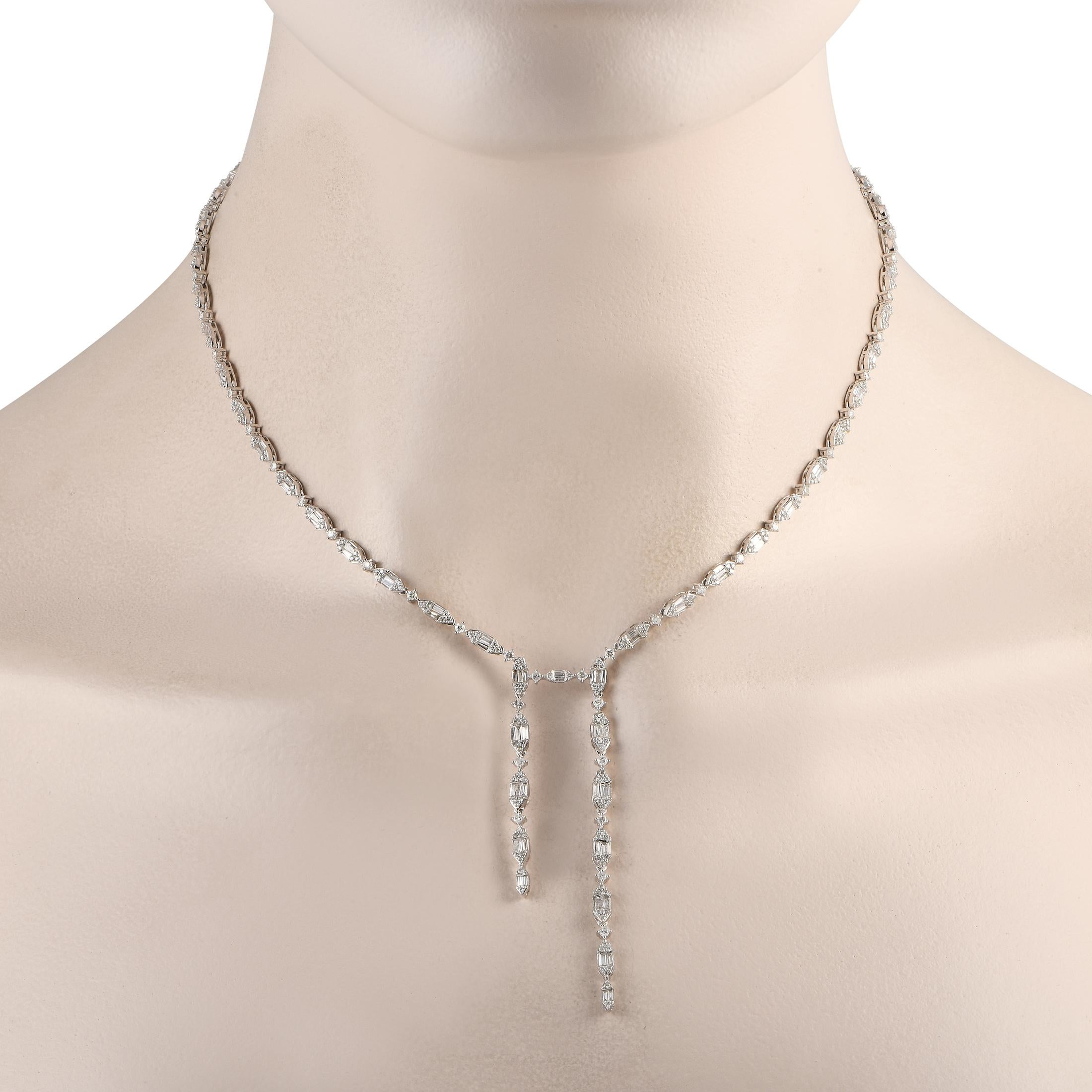 Sparkling Diamonds with a total weight of 4.80 carats allow this sleek, sophisticated necklace to effortlessly catch the light. Crafted from 14K White Gold, it measures 16.0 long and includes two dangling pendants measuring 2.5 long.This jewelry