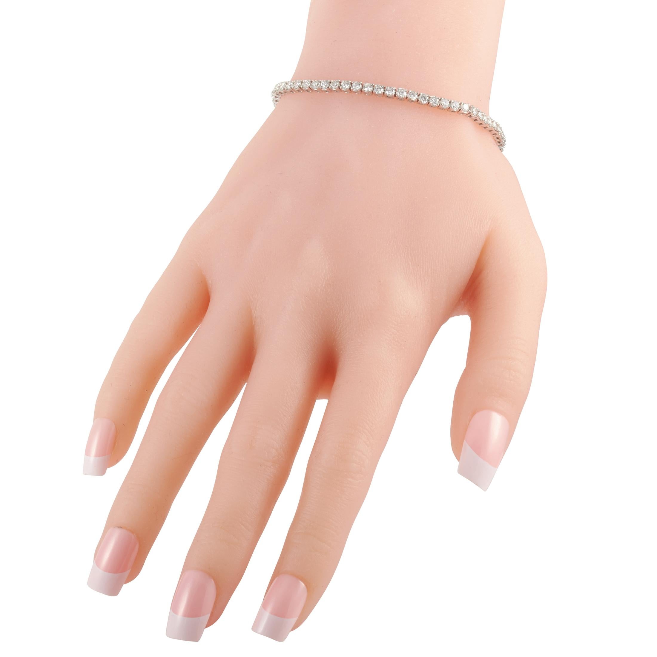 This LB Exclusive tennis bracelet is made of 14K white gold and embellished with diamonds that amount to 4.92 carats. The bracelet weighs 8 grams and measures 7.50” in length.
 
 Offered in brand new condition, this jewelry piece includes a gift
