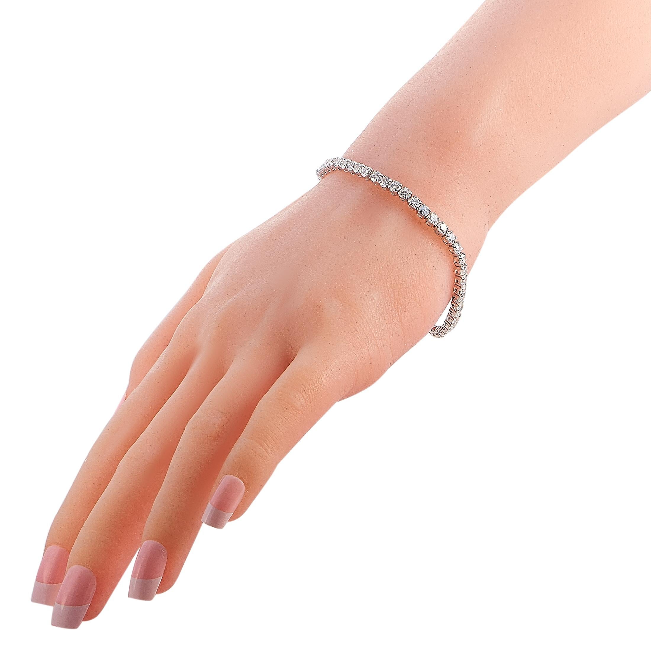 This LB Exclusive tennis bracelet is made out of 14K white gold and diamonds that total 7.23 carats. The bracelet weighs 10 grams and measures 7.50” in length.

Offered in brand new condition, this jewelry piece includes a gift box.