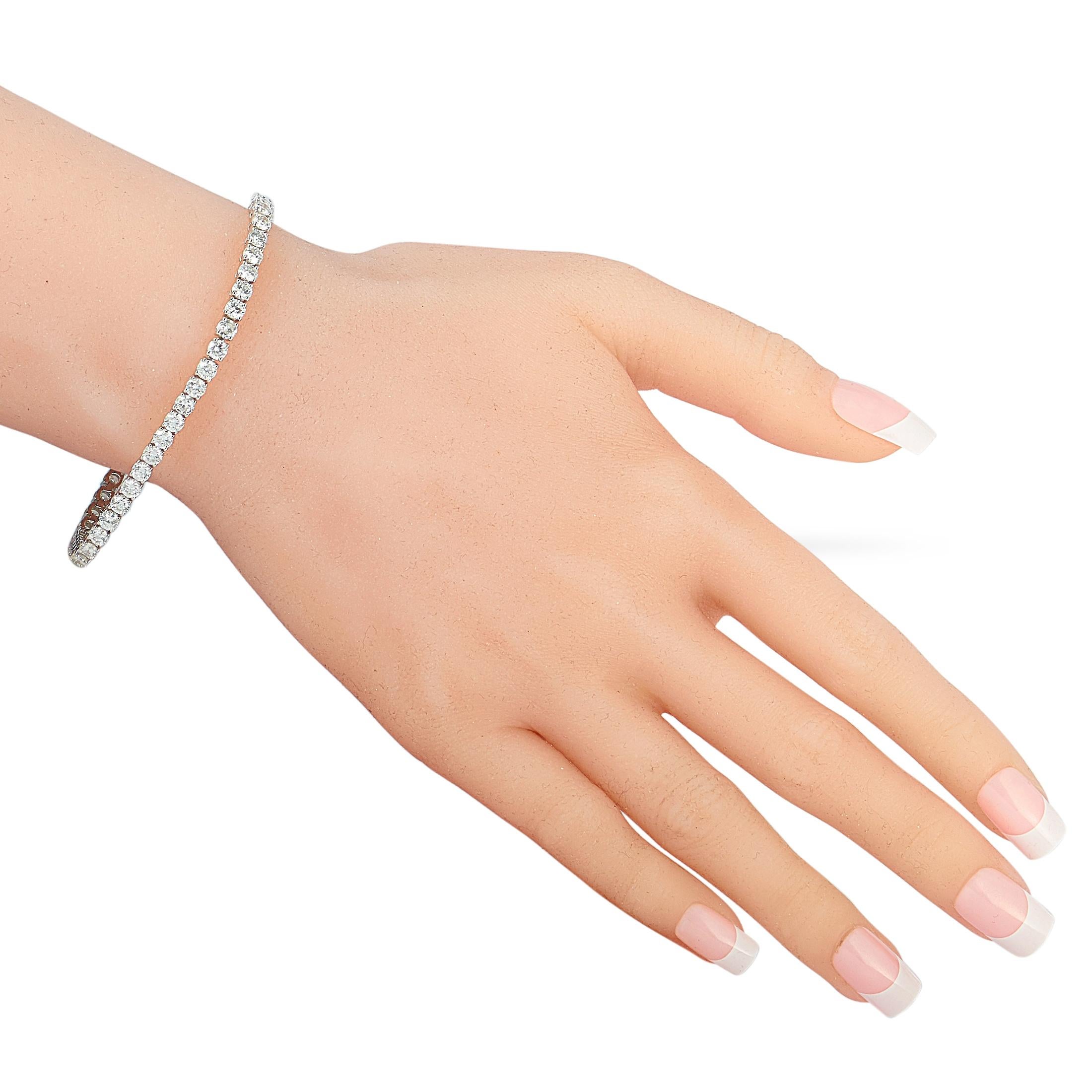 This LB Exclusive tennis bracelet is made of 14K white gold and embellished with diamonds that amount to 7.50 carats. The bracelet weighs 12.3 grams and measures 7.25” in length.
 
 Offered in brand new condition, this jewelry piece includes a gift
