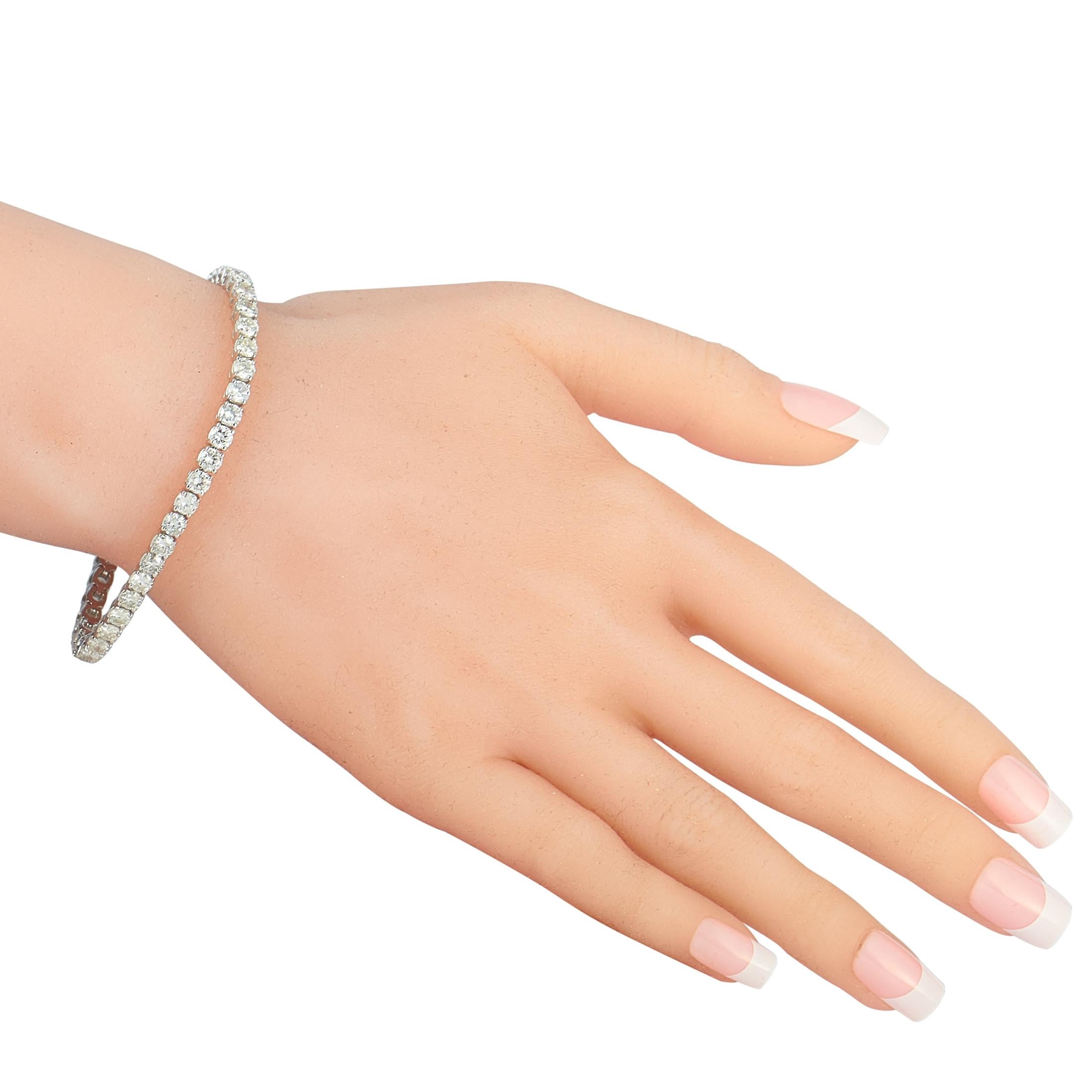 This LB Exclusive bracelet is made of 14K white gold and embellished with diamonds that amount to 9.21 carats. The bracelet weighs 15.6 grams and measures 7” in length.
 
 Offered in brand new condition, this jewelry piece includes a gift box.