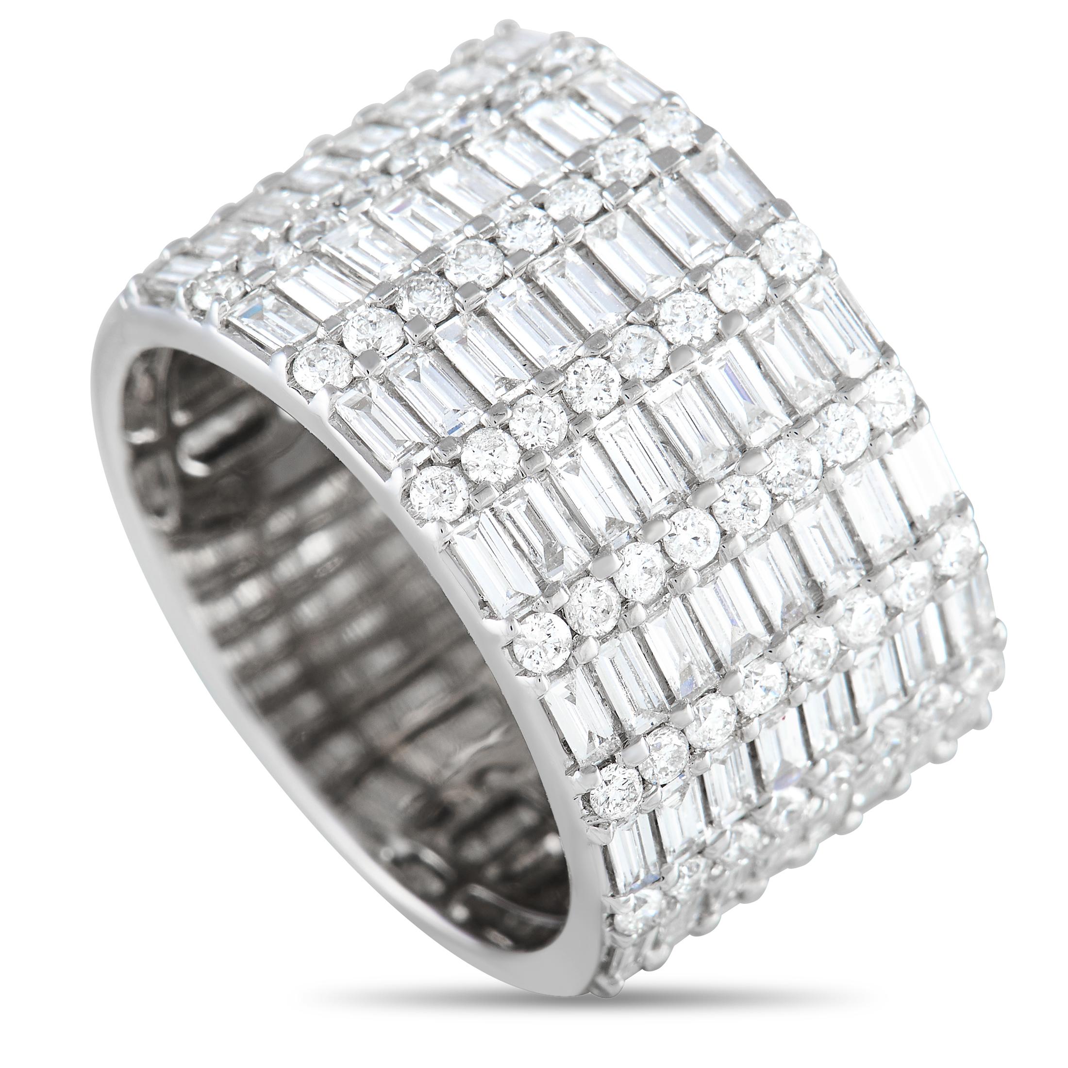Elegant and edgy, this wide-band ring will deliver a bold and brilliant boost of style to your looks. The band measures 13mm wide and features eight rows of diamonds, alternating between round and baguette-cut diamonds. Top dimensions measure 20mm x