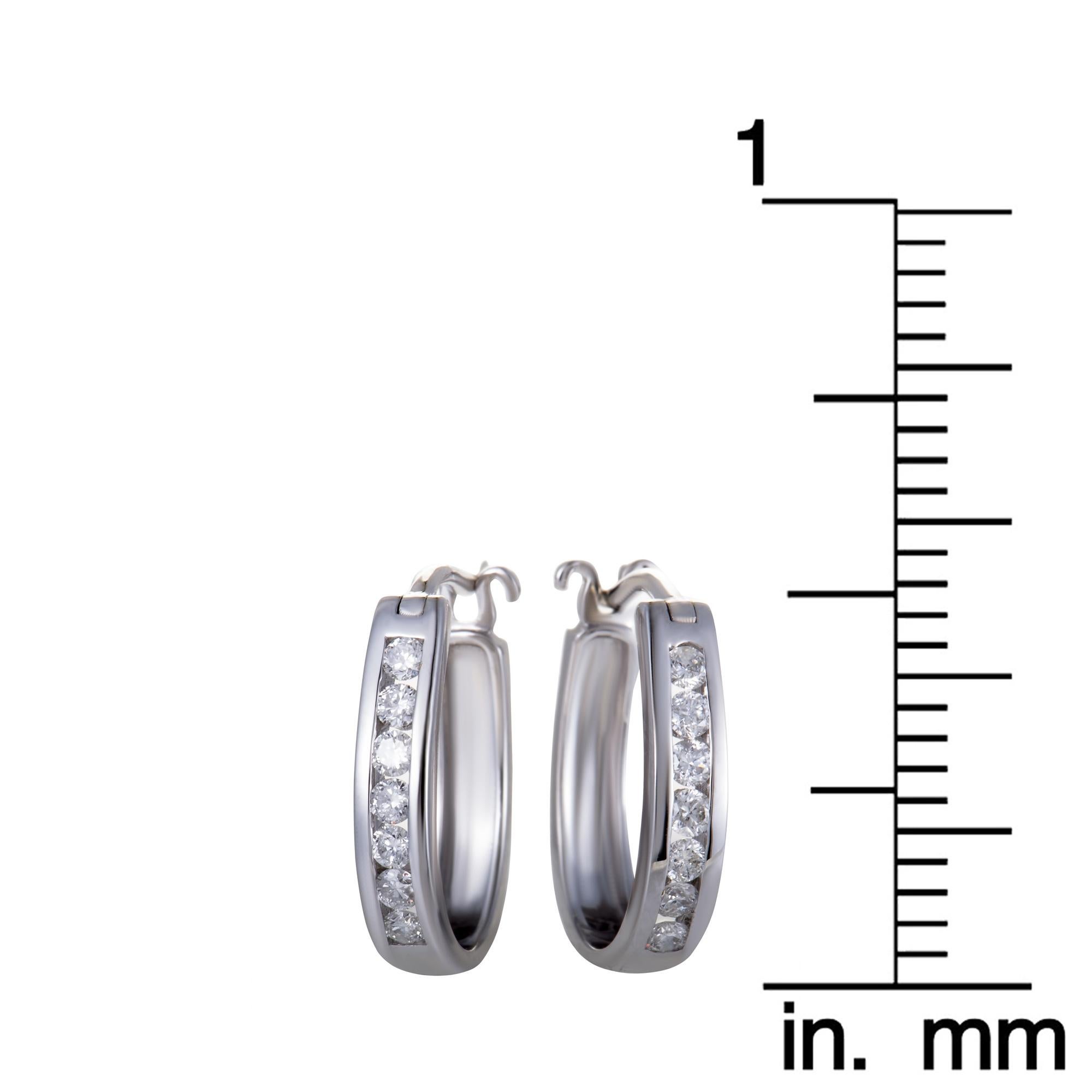 LB Exclusive 14K White Gold Oval Channel Set Diamond Hoop Huggies Earrings In New Condition For Sale In Southampton, PA