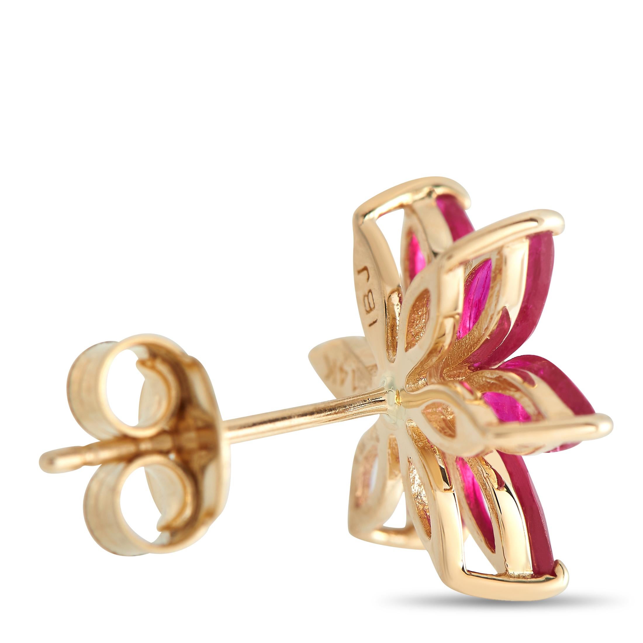 Polish your ladylike looks with these floral earrings decorated with marquise-cut rubies. Each 14K yellow gold stud has a floral basket mounted with marquise ruby petals and a diamond center. A push-back closure fastens the earring in place.Offered