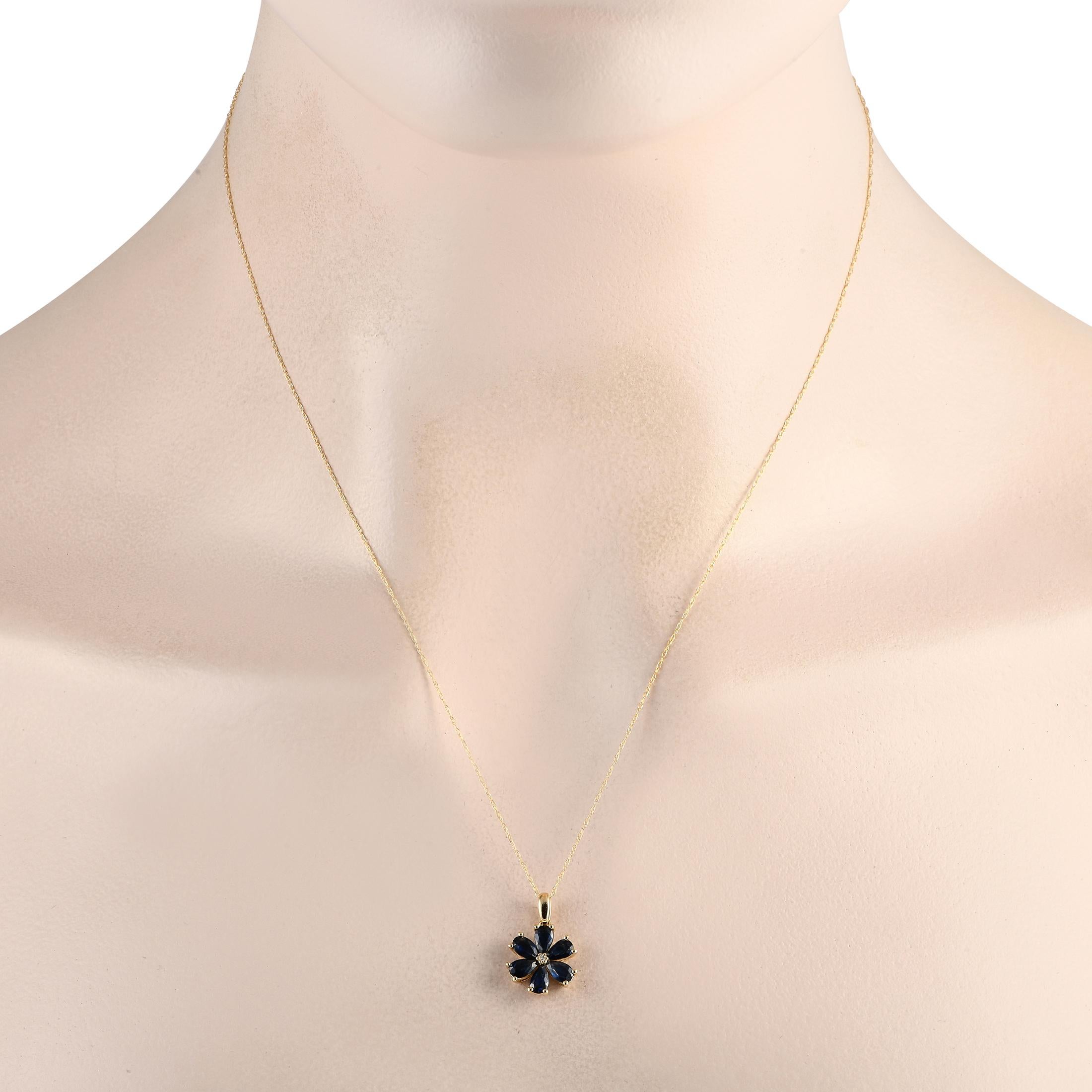 A lovely gift to celebrate one's love for nature. This necklace has a flower-shaped pendant decorated with a diamond center and six sapphire petals. The subtle elegance of this piece makes it suitable for daily wear. The necklace chain measures 18