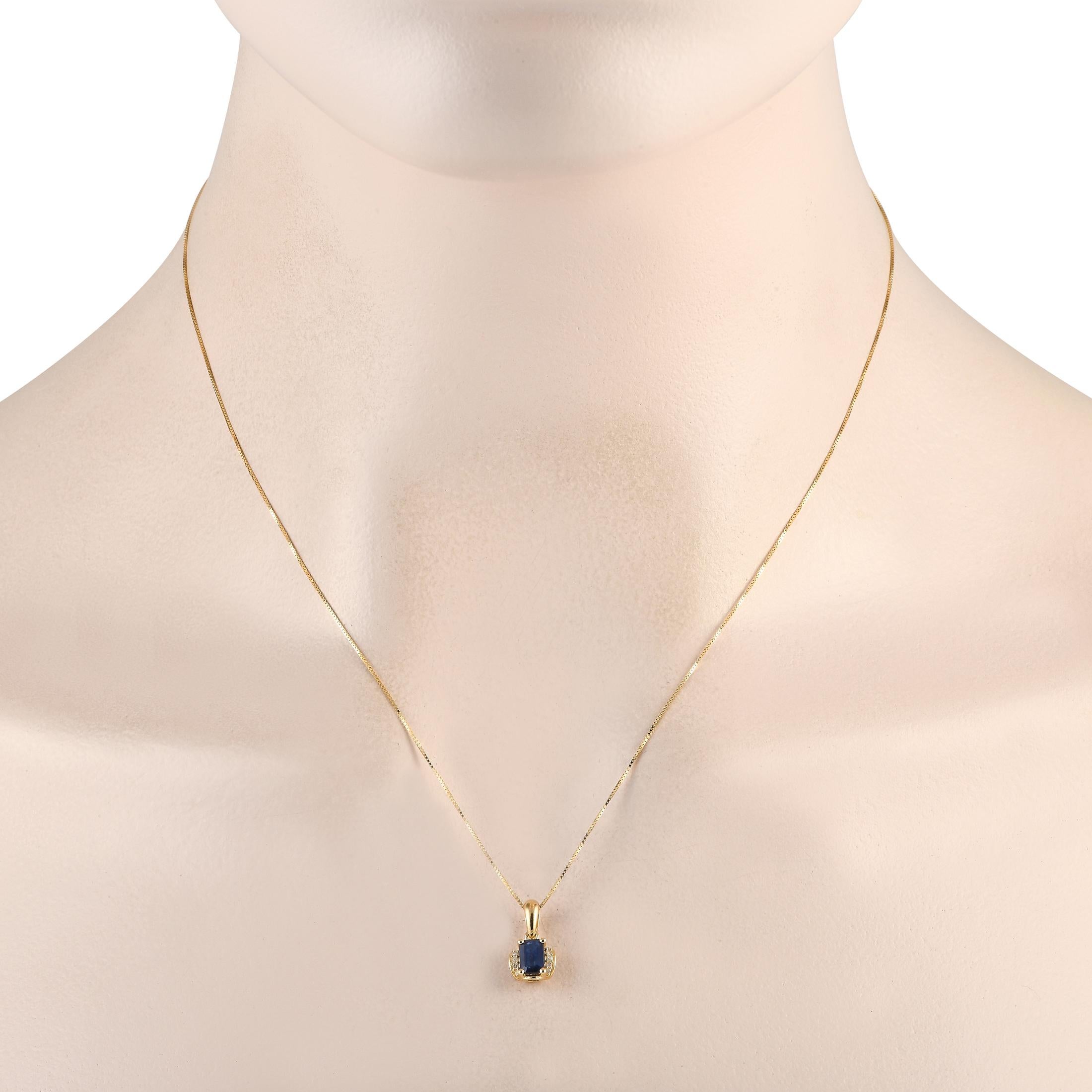 Add a touch of luxury to any ensemble with this simple, elegant necklace. Suspended from a sleek 18 box chain, youll find a 14K Yellow Gold pendant measuring 0.50 long by 0.25 wide. A single Sapphire gemstone makes a statement at the center, while
