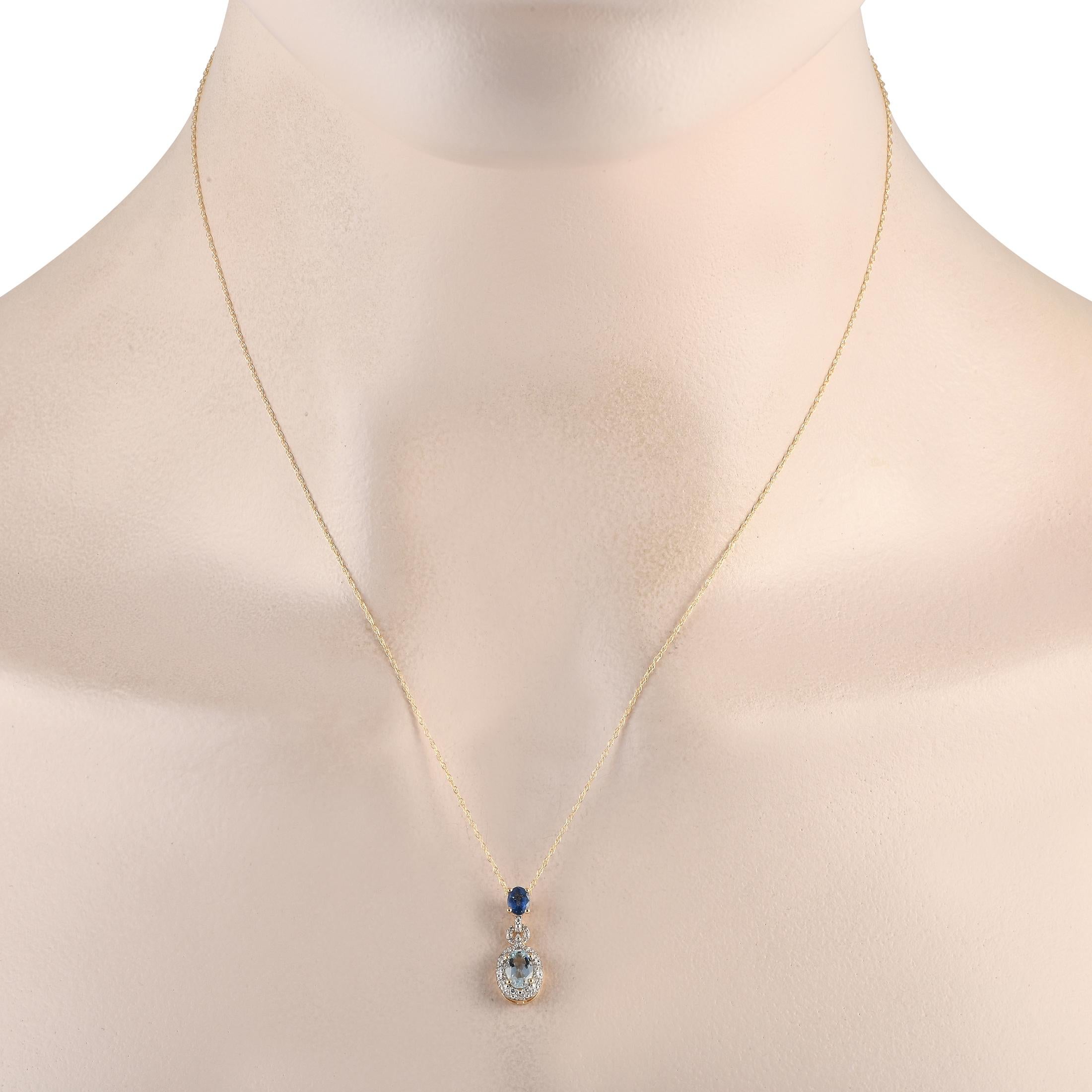 Let this necklace of regal beauty awaken the princess in you. This yellow gold piece features a sapphire bail holding a diamond-traced frame with an aquamarine center. The dainty chain completes the feminine flair of this piece.This brand new LB