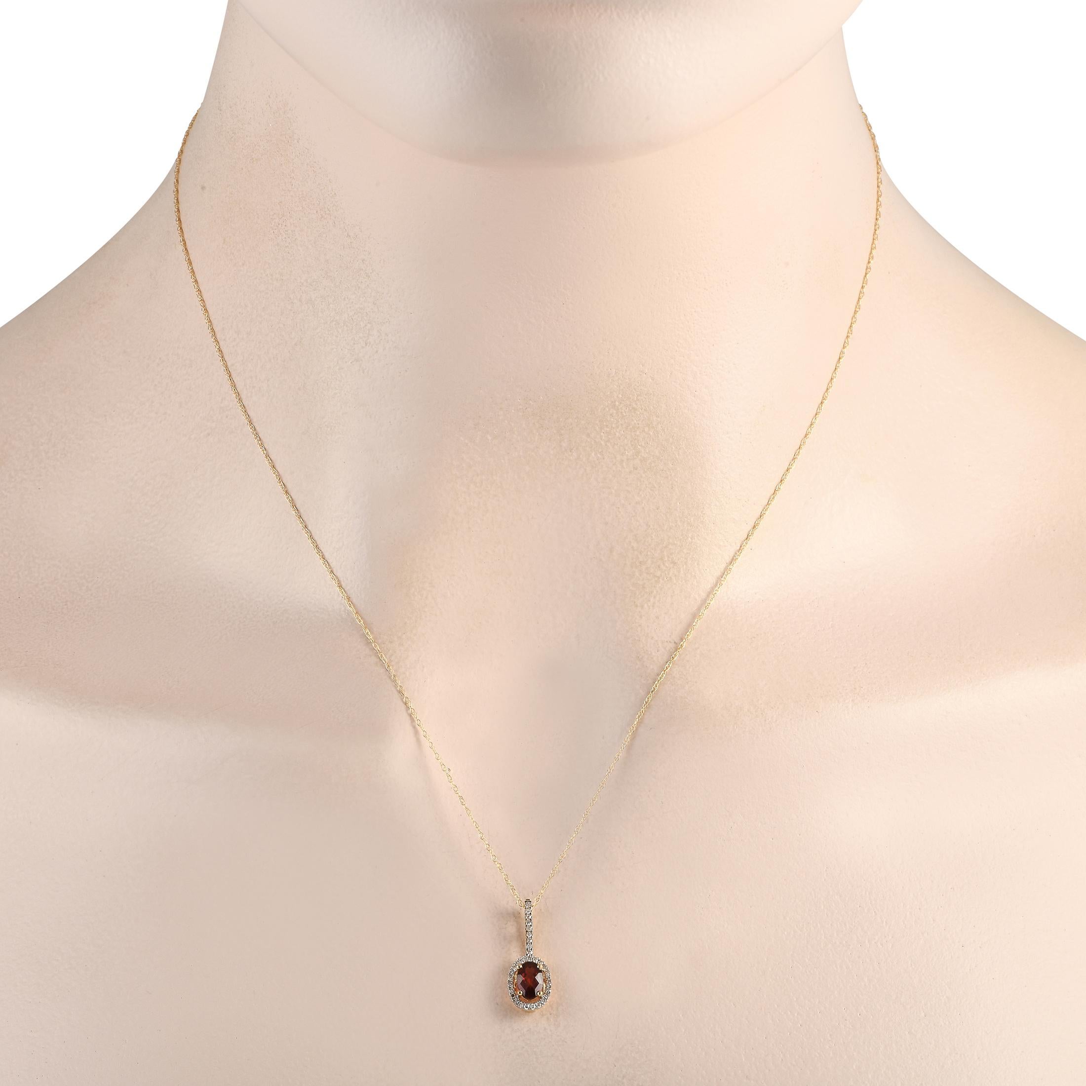 This timeless necklace will continually capture your imagination. Suspended from a delicate 18K Chain, youll find a simple, elegant 14K Yellow Gold pendant measuring 0.75 long by 0.25 wide. Sparkling Diamonds totaling 0.09 carats elevate the